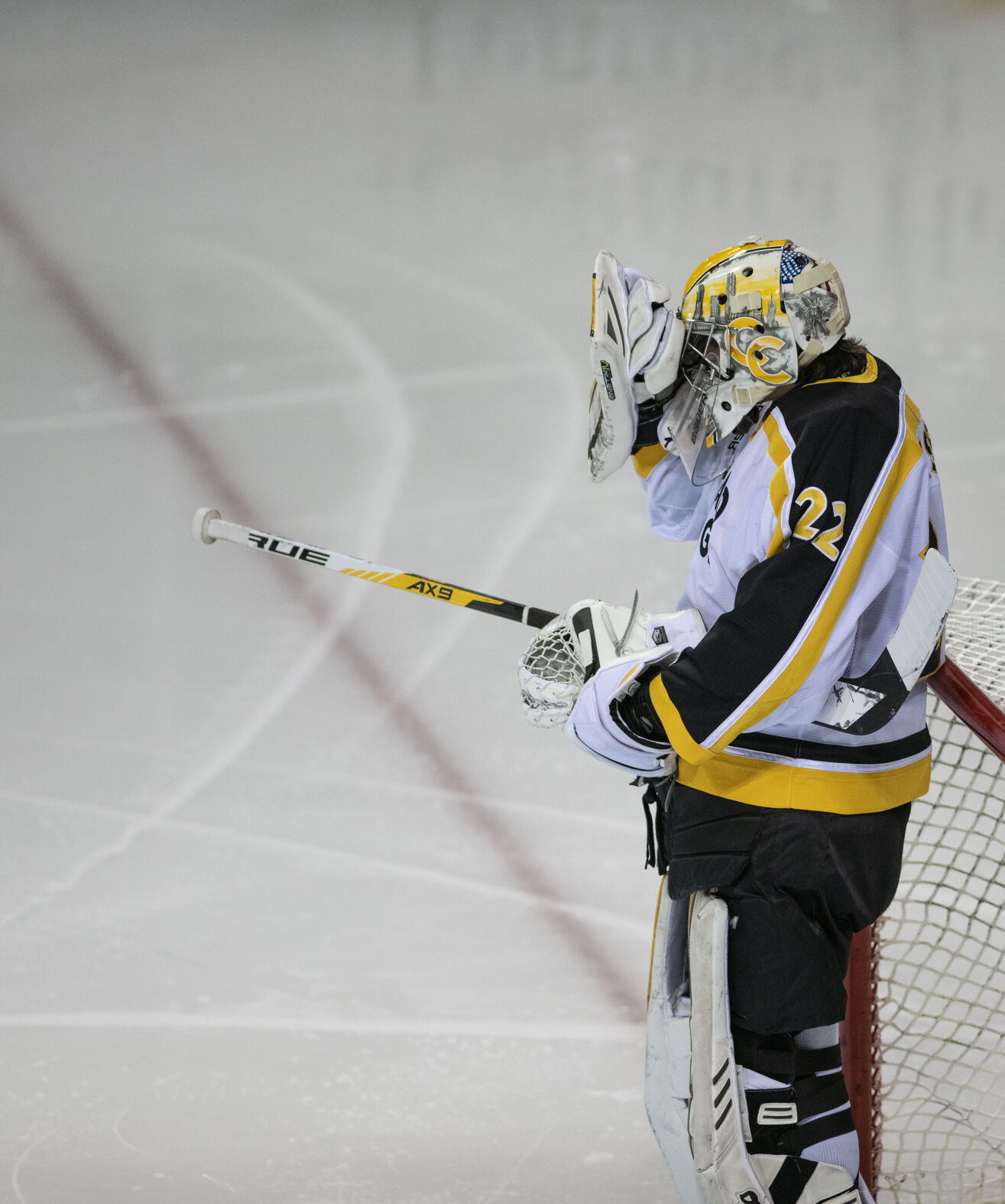 Colorado College freshman goalie Dominic Basse (22) reacts after DU scores a goal during college hockey game as the CC Tigers and DU Battle for the Gold Pan at The Broadmoor World Arena in Colorado Springs on Thursday, Feb. 25, 2021. Denver won the game against the CC Tigers by a score of 5 to 1. (Chancey Bush/ The Gazette) (Chancey Bush/ The Gazette)