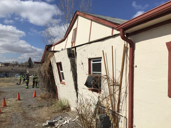 Dump truck crashes into home