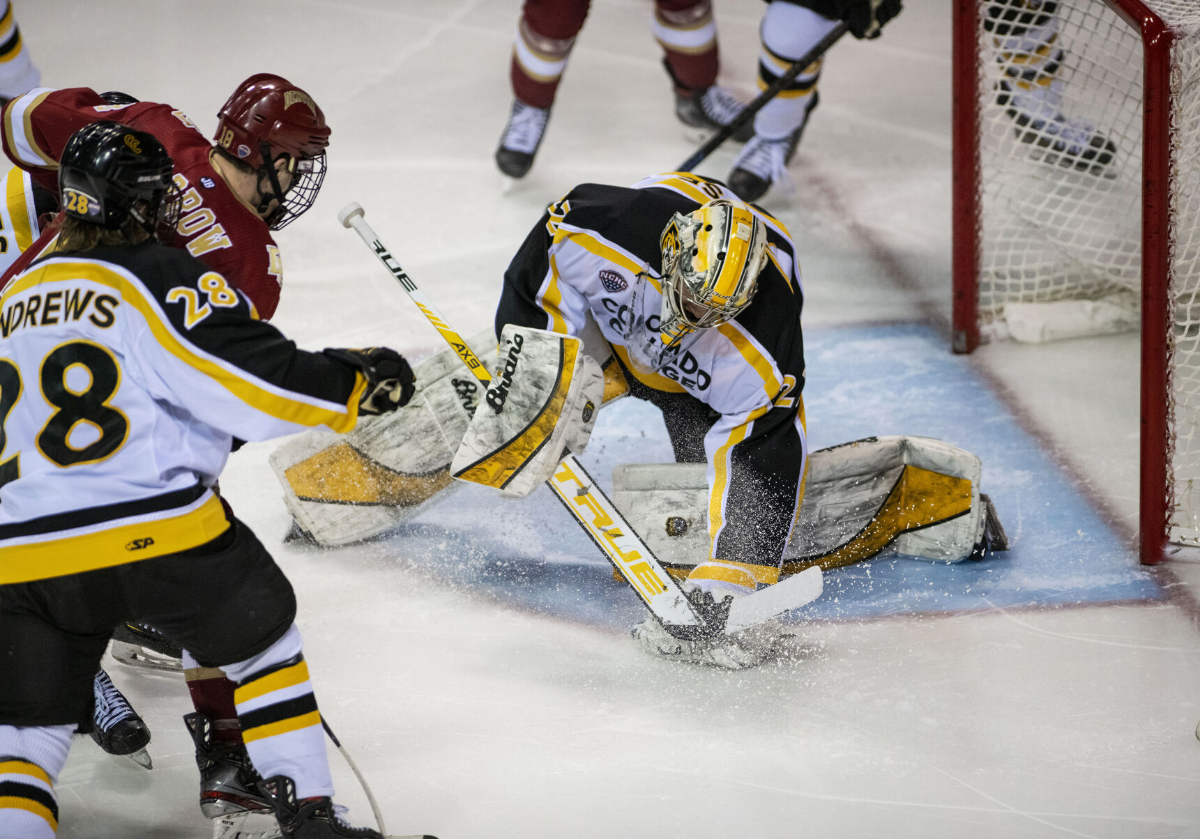 Colorado College freshman goalie Dominic Basse (22) makes a glove save during the Battle for the Gold Pan at The Broadmoor World Arena in Colorado Springs on Thursday, Feb. 25, 2021. (Chancey Bush/ The Gazette) (Chancey Bush/ The Gazette)