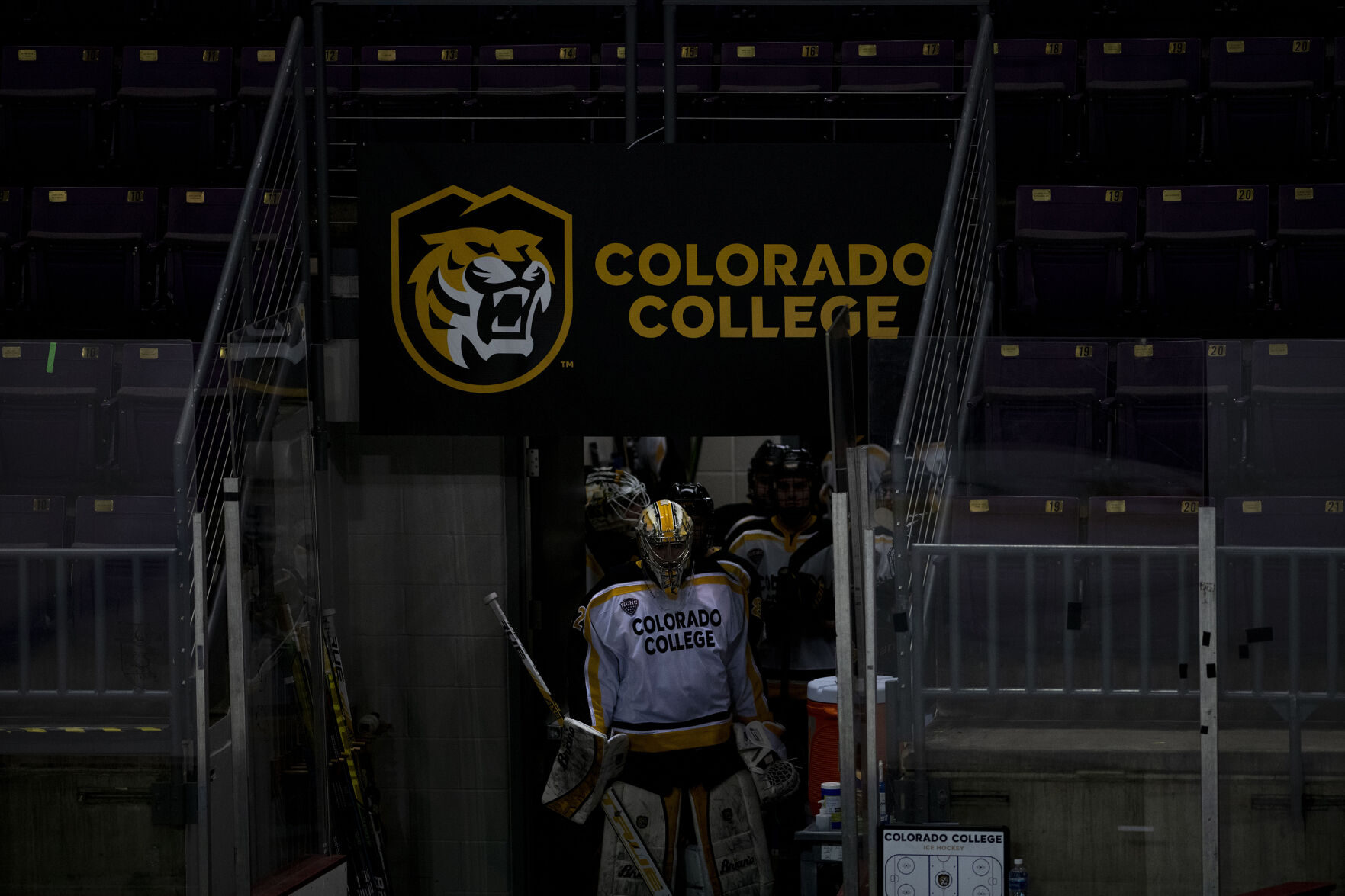 Colorado College freshman goalie Dominic Basse (22) prepares to take to the ice during college hockey game as the CC Tigers and DU Battle for the Gold Pan at The Broadmoor World Arena in Colorado Springs on Thursday, Feb. 25, 2021. Denver won the game against the CC Tigers by a score of 5 to 1. (Chancey Bush/ The Gazette) (Chancey Bush/ The Gazette)