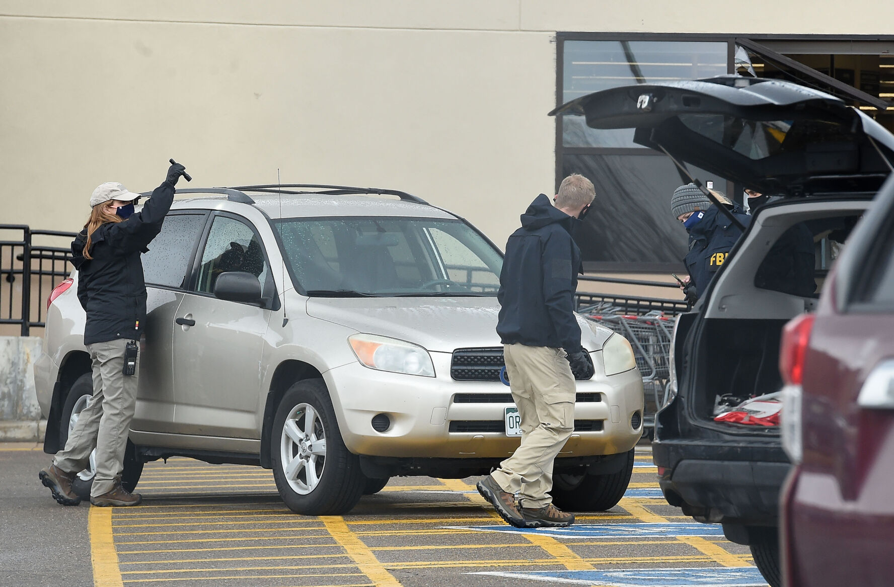 Cars involved in the mass shooting at the Boulder King Soopers on Monday were still being investigated on Monday, March 23, 2021. (Photo by Jerilee Bennett, The Gazette) (JERILEE BENNETT)