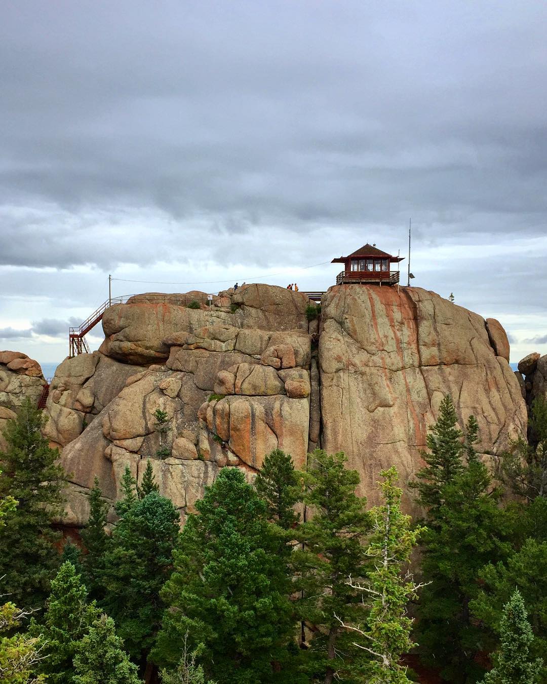 3. Devil’s Head LookoutPanoramic views of the Rocky Mountains await from the Devil’s Head Lookout in Sedalia, including Pikes Peak on a clear day. The approximately 1.5-mile trail is very steep up 143 steps to the lookout at 9,748 feet above sea level.Author’s Note: Due to safety concerns, the stairs and lookout tower are closed to visitation. The trail is still open, but the staircase to the top of the tower is not. Rampart Range Road is typically closed during winter and early spring.Photo Credit: Spencer McKee OutThere Colorado.