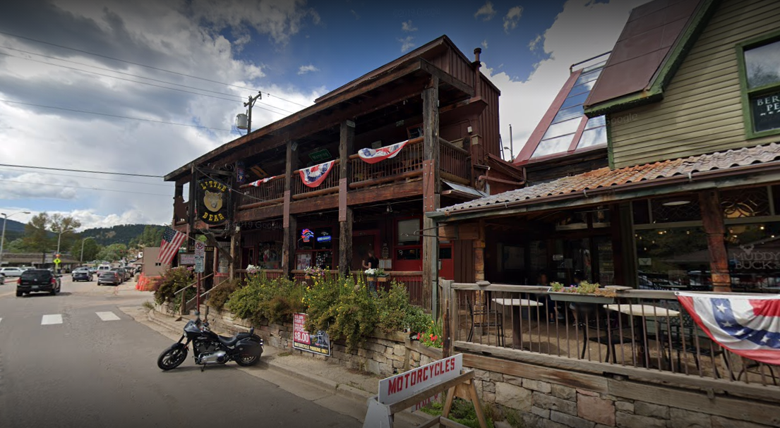 5. Little Bear Saloon - EvergreenClaimed to be Colorado’s rowdiest mountain town bar, the Little Bear Saloon in Evergreen maintains the Old West charm. Look for names carved into the wood walls and ceiling, signed posters and shirts from musicians, license plates from areas around the world, and even dozens of brassieres hanging over the music stage. The restaurant serves homemade pizzas, burgers, and more.Photo via Google Maps.