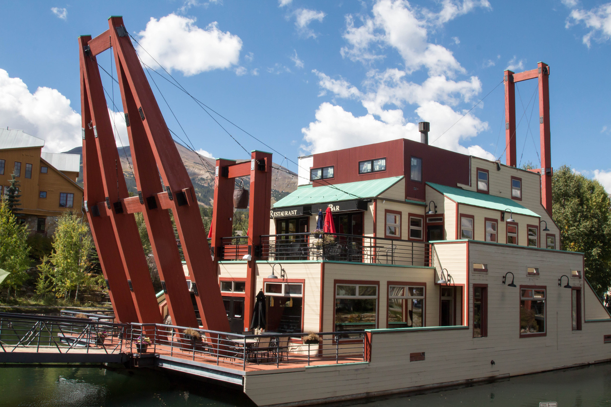 4. The Dredge - BreckenridgeOne of the most iconic scenes in Breckenridge - other than the ski slopes - is a retired, 2-million-pound dredge in the heart of downtown. Ollie’s Pub & Grill opened its restaurant in the dredge in early 2020. The pub has 20 Colorado beers on tap, and dishes up wings, burgers, sandwiches, salads, and more.Photo Credit: KaraGrubis (iStock).