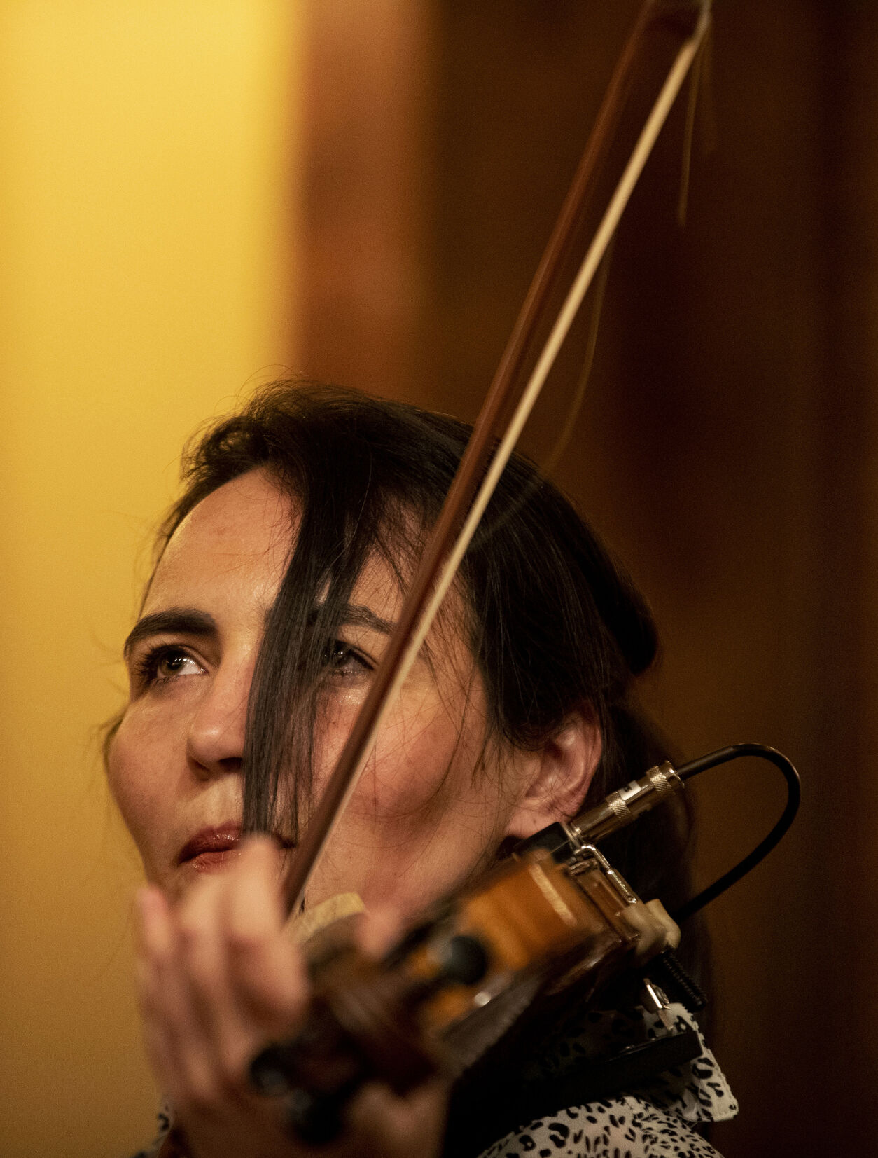 Nerea Gourlaouen, or Nerea the Fiddler, performs Irish music on her fiddle and step dances at Jack Quinn's Irish Pub and Restaurant in downtown Colorado Springs on Saturday, Feb. 27, 2021. At the age of 15, she named herself the Crazy Fiddle Lady on her YouTube channel, referencing her ability to simultaneously fiddle and step dance. (Chancey Bush/ The Gazette) (Chancey Bush/ The Gazette)