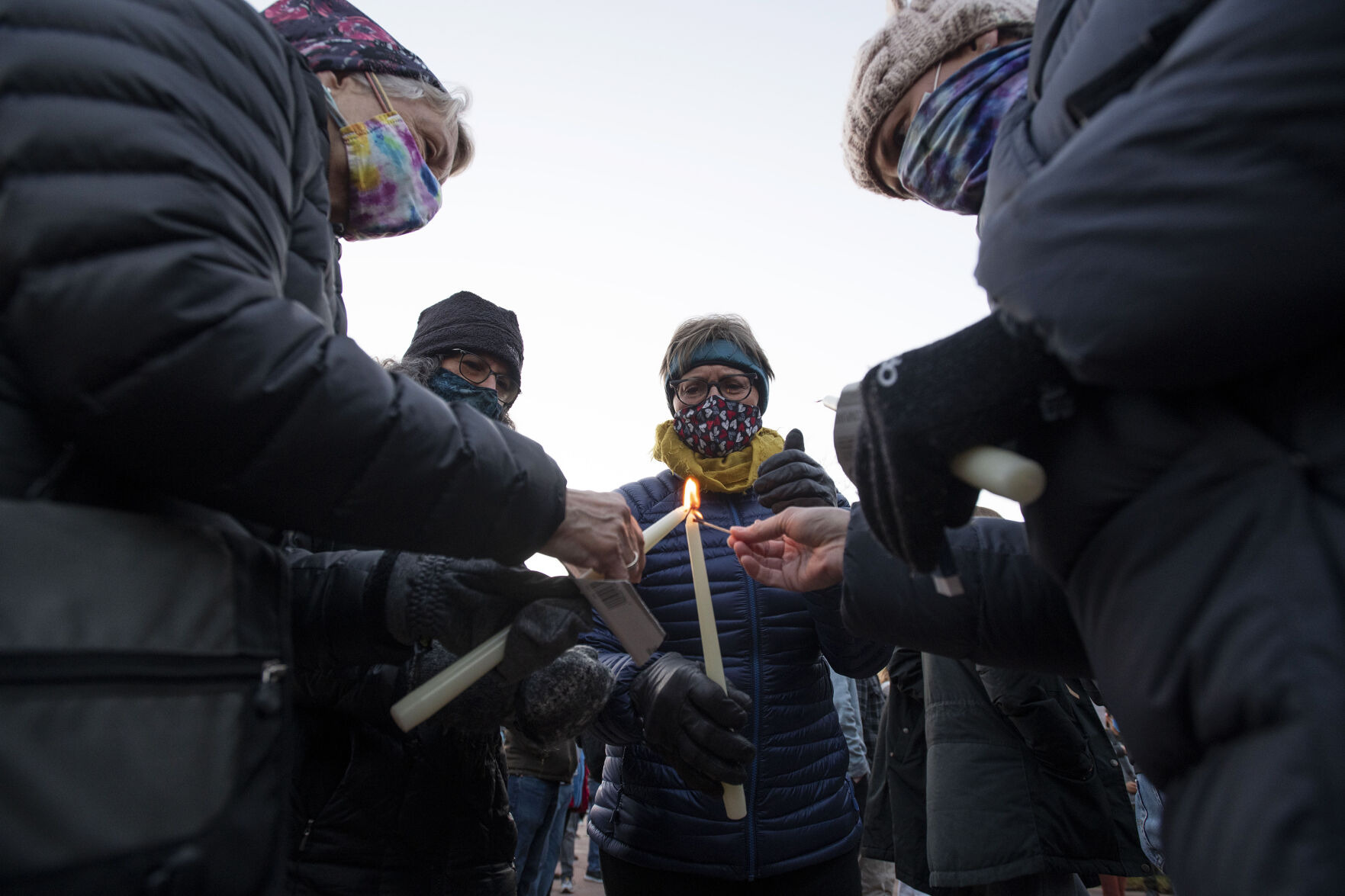 A candlelight vigil to mourn the loss of 10 people including a police officer who were killed in a mass shooting at King Soopers supermarket on Monday, outside the courthouse in Boulder, Colo., on Wednesday, March 24, 2021. (Chancey Bush/ The Gazette) (Chancey Bush)