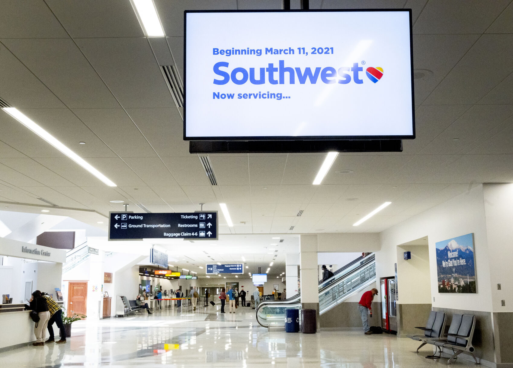 A sign above the baggage claim area at Colorado Springs Airport last week announces the arrival of Southwest Airlines. The airline began servicing Colorado Springs Thursday.. (Photos by Christian Murdock, The Gazette)