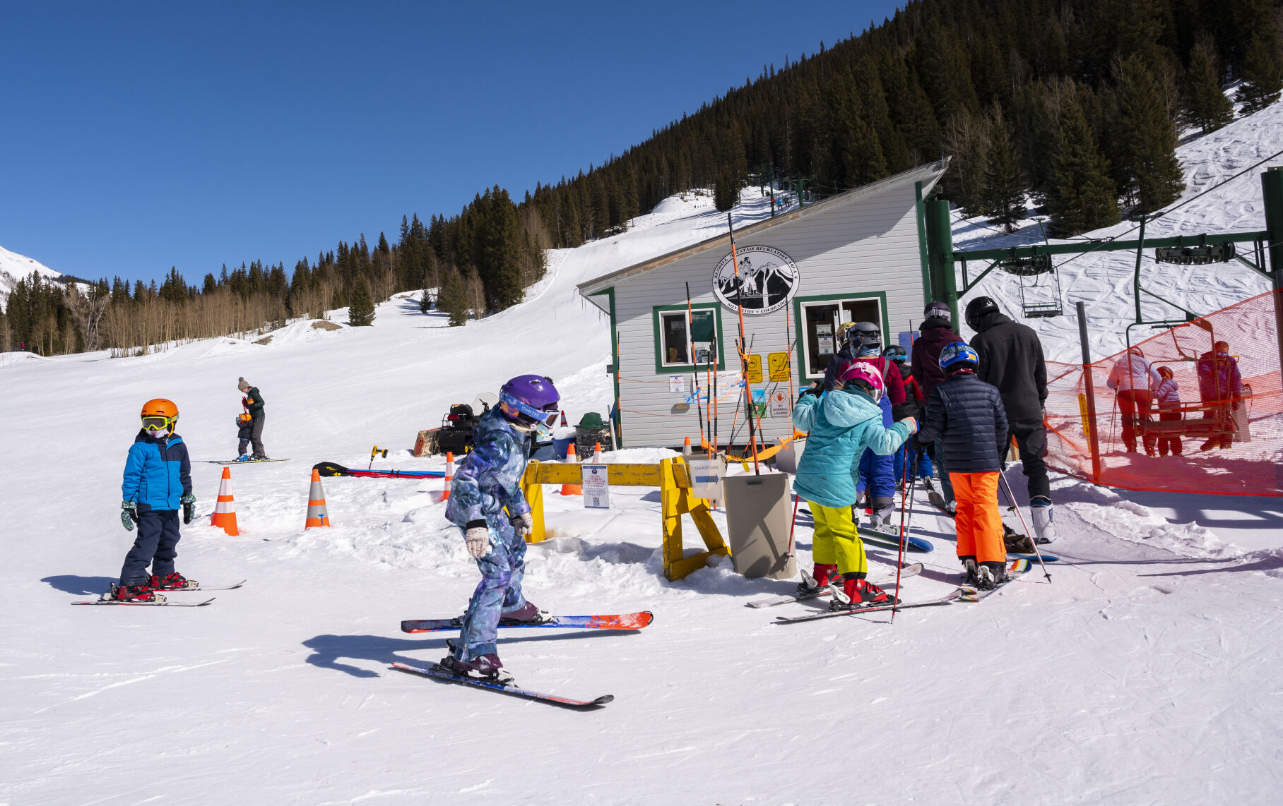 Skiers line up for the only chair at Kendall Mountain Ski Area in Silverton Friday, Feb. 26, 2021. (The Gazette, Christian Murdock) (Christian Murdock/The Gazette)