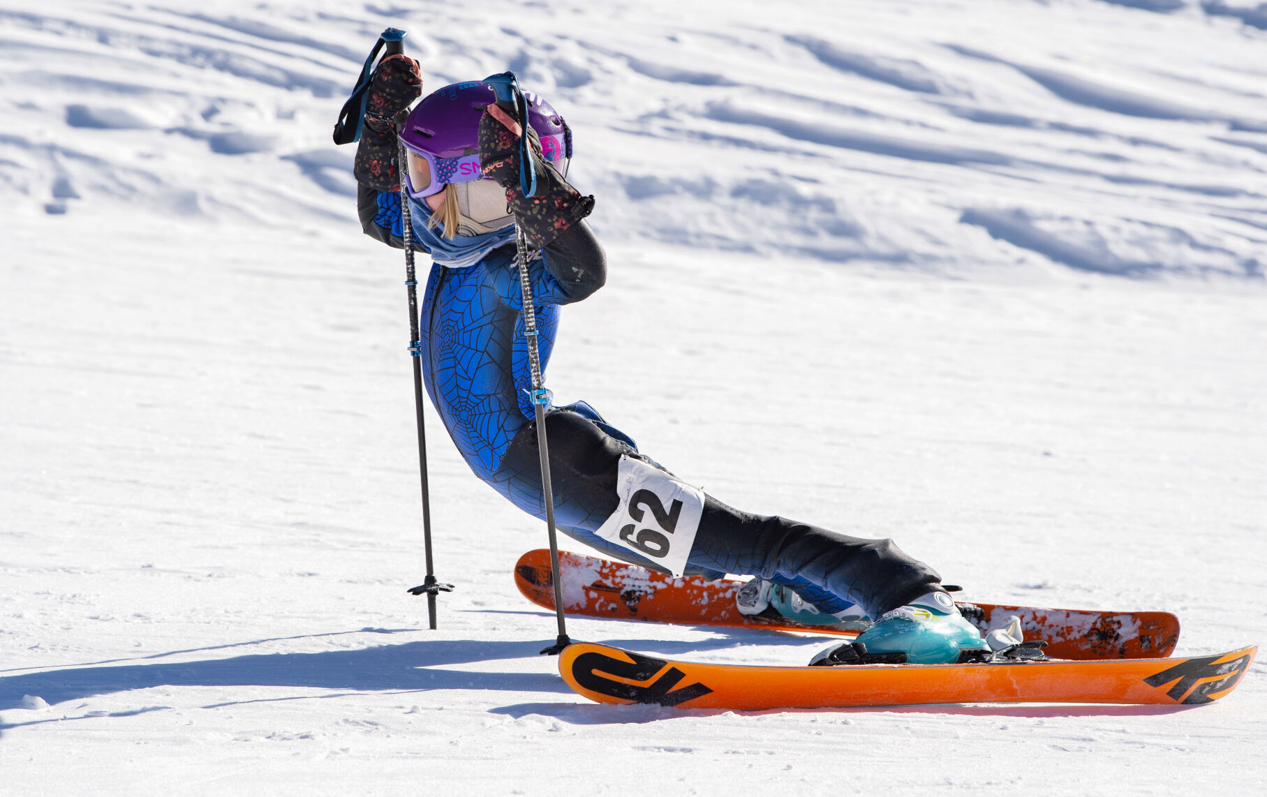 Kate Barney, 8, stretches after finishing her run Friday, Feb. 26, 2021, during the Kendall Mountain Community Races series held at the ski area on Fridays. The race is sponsored by the Silverton Ski team and the city of Silverton. (The Gazette, Christian Murdock) (Christian Murdock/The Gazette)