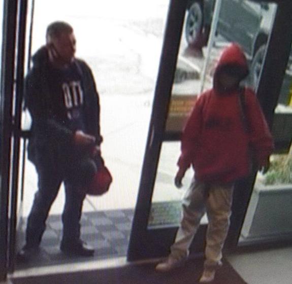 Police release image of suspects accused of stealing vehicle with 15-year-old dog inside