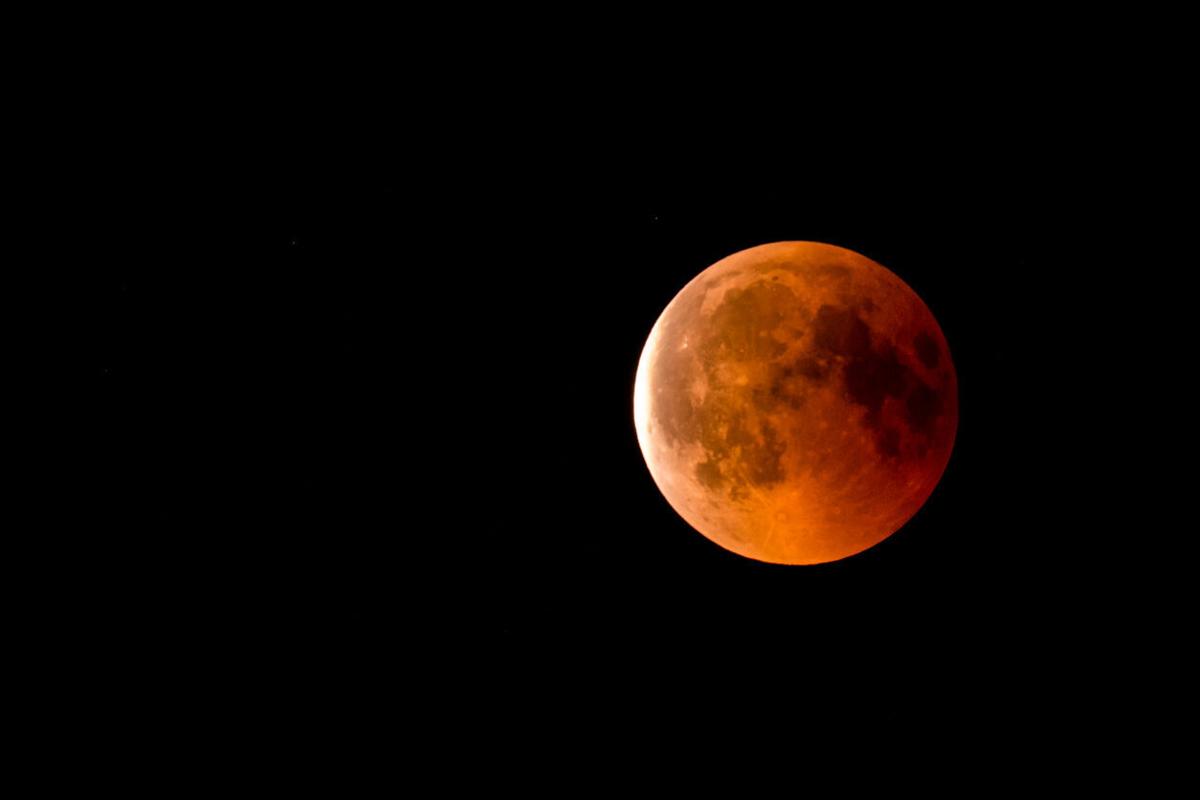 Full moon eclipse at night in the summer. Photo Credit: Petr Svoboda (iStock).