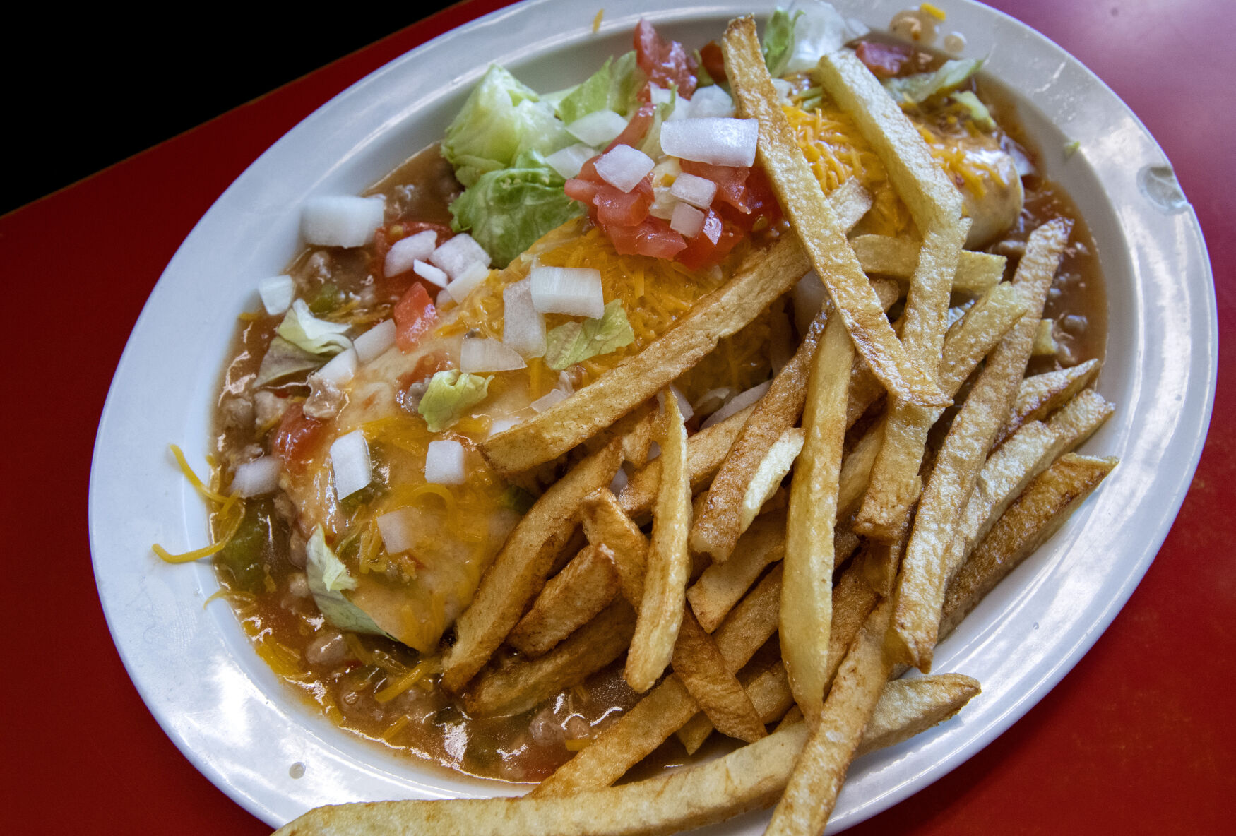 The breakfast burrito with homemade French fries at George’s Drive Inn Thursday, April 8, 2021. (The Gazette, Christian Murdock) (Christian Murdock/The Gazette)
