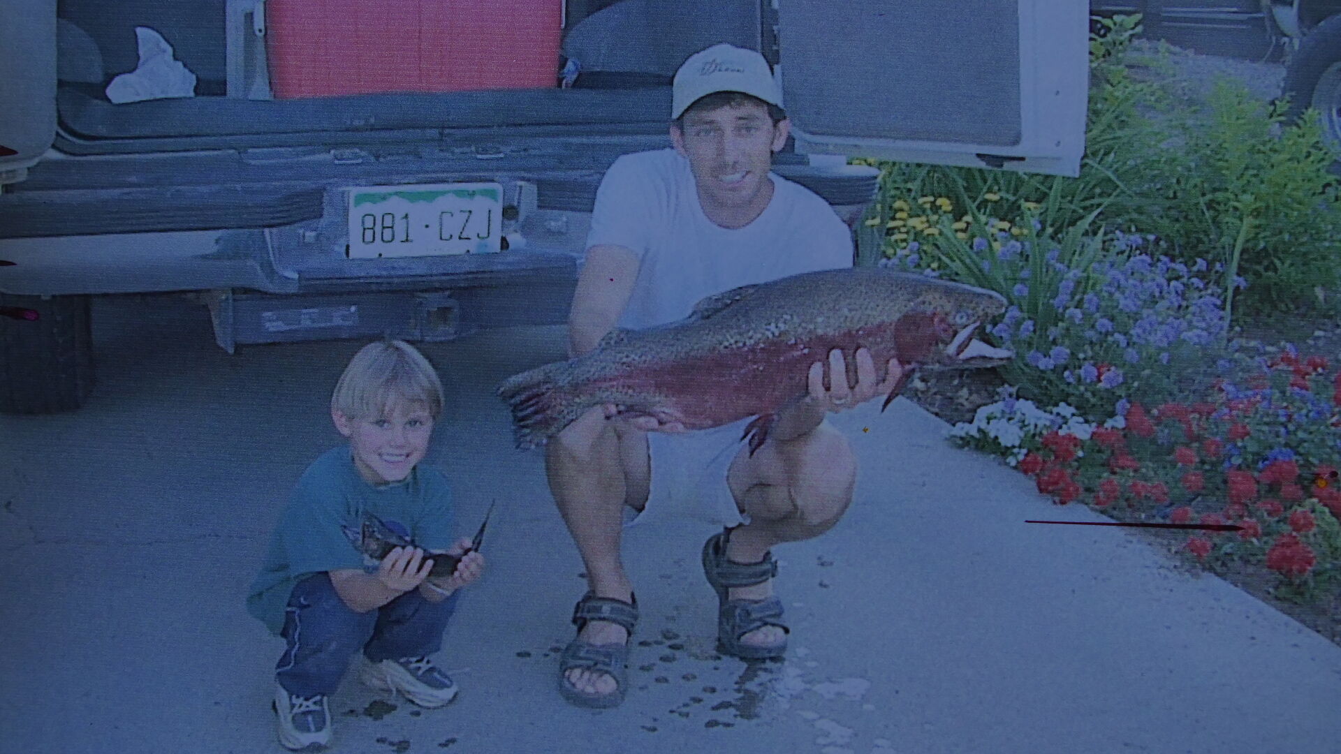 Lee Cox with his state record rainbow trout — the main species stocked in Colorado — from 2003. The fish weighed 19 pounds and measured 34 inches. Photo courtesy Colorado Parks and Wildlife