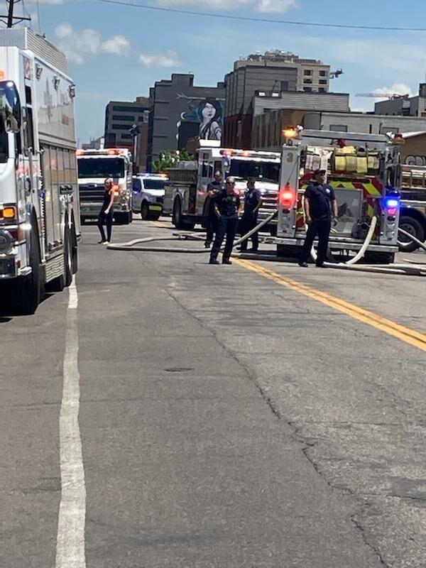 Firefighters respond to an apartment fire at 2840 Blake St. on Sunday, May 23, 2021. (Photo courtesy of the Denver Fire Department)