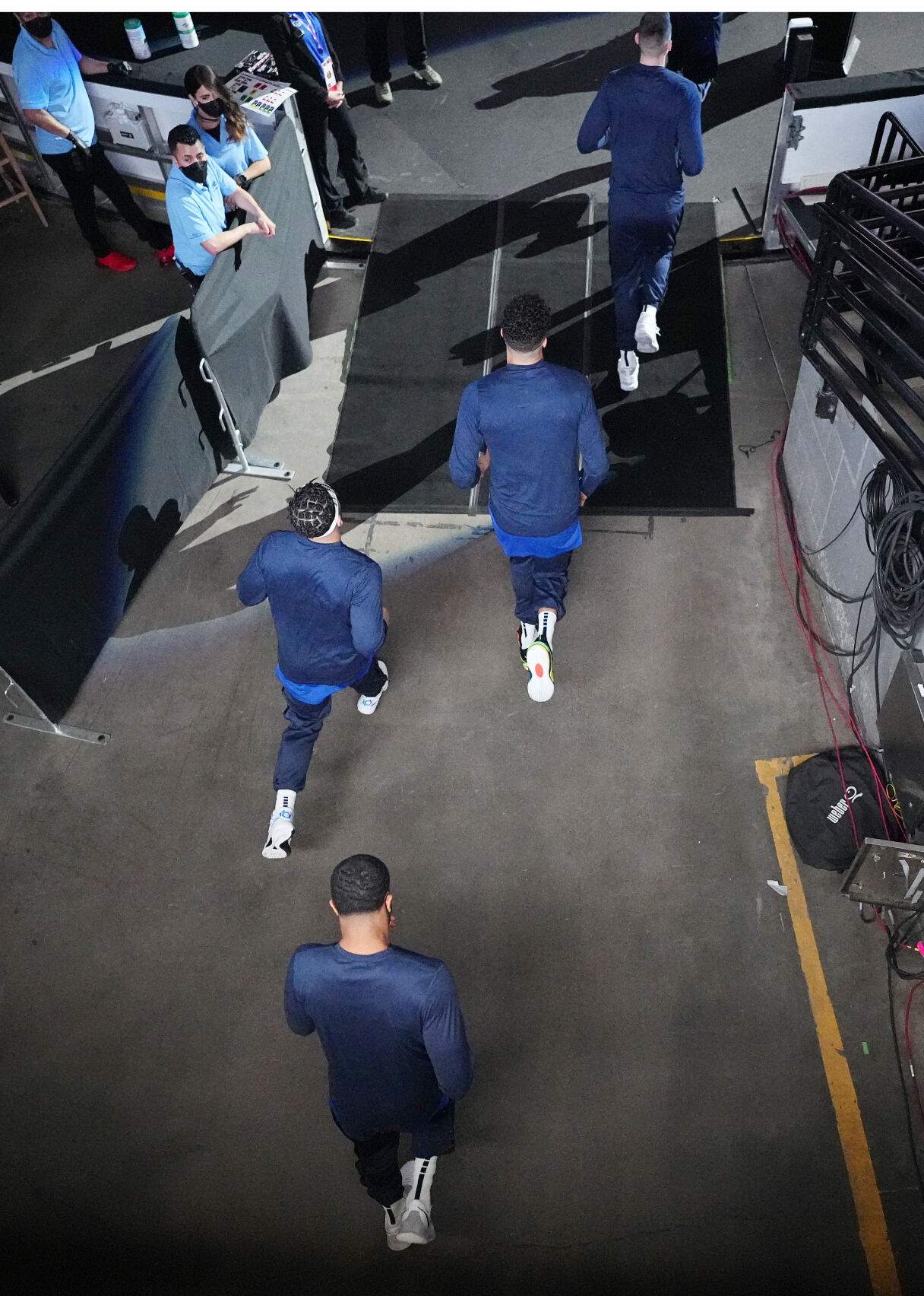 Members of the Denver Nuggets take the court against the Portland Trail Blazers in before Game 1 of a first-round NBA playoff series Saturday, May 22, 2021, in Denver. (AP Photo/Jack Dempsey) (Jack Dempsey)
