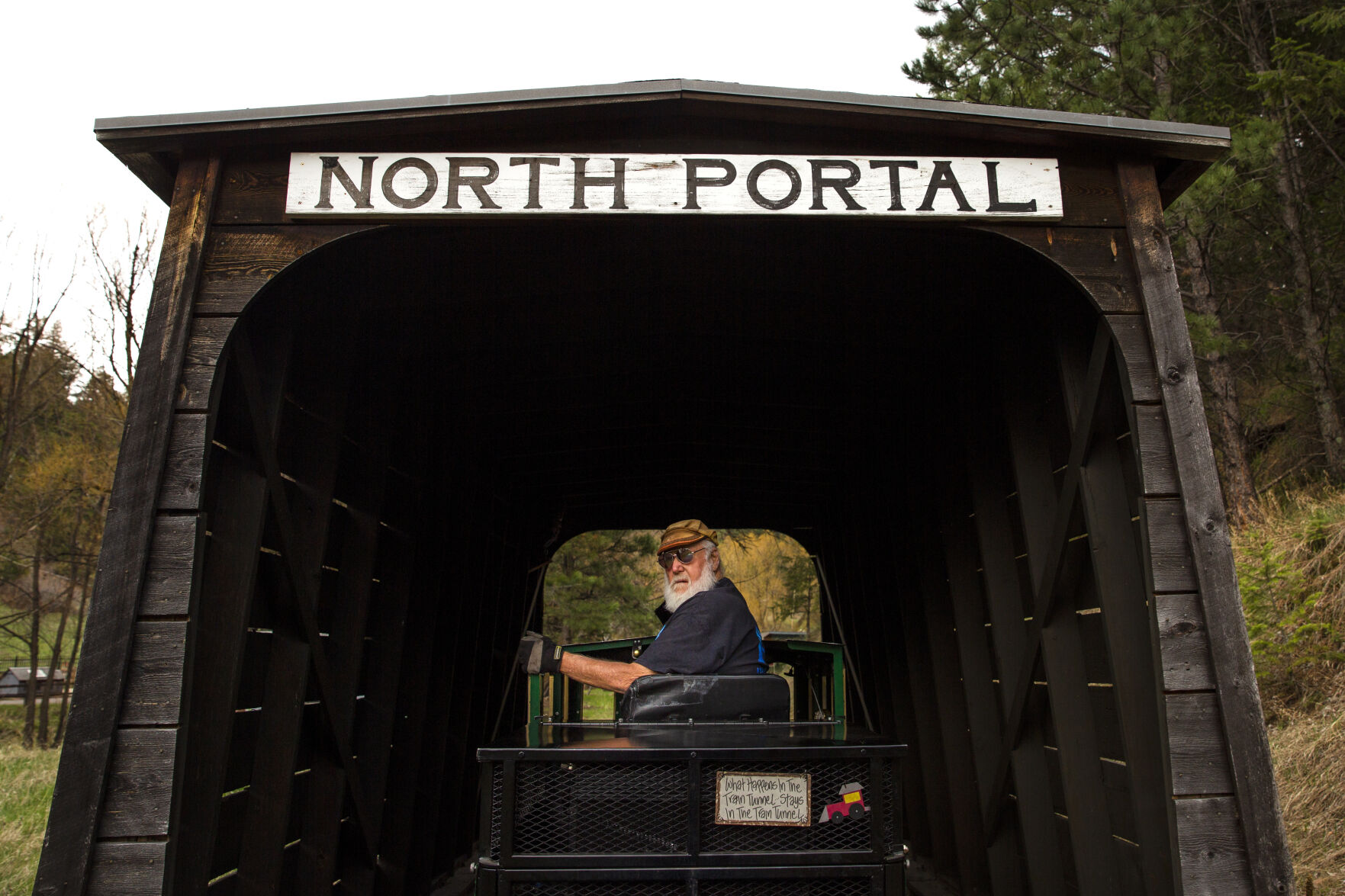 Engineer Dave Christopherson looks back at the passengers on the train as he goes through the north portal train tunnel. (KatieKlannkatie.klann@gazette.comhttps://secure.gravatar.com/avatar/15e8af752374ad1abb67090ceaed3ec3?d=mm&r=g)