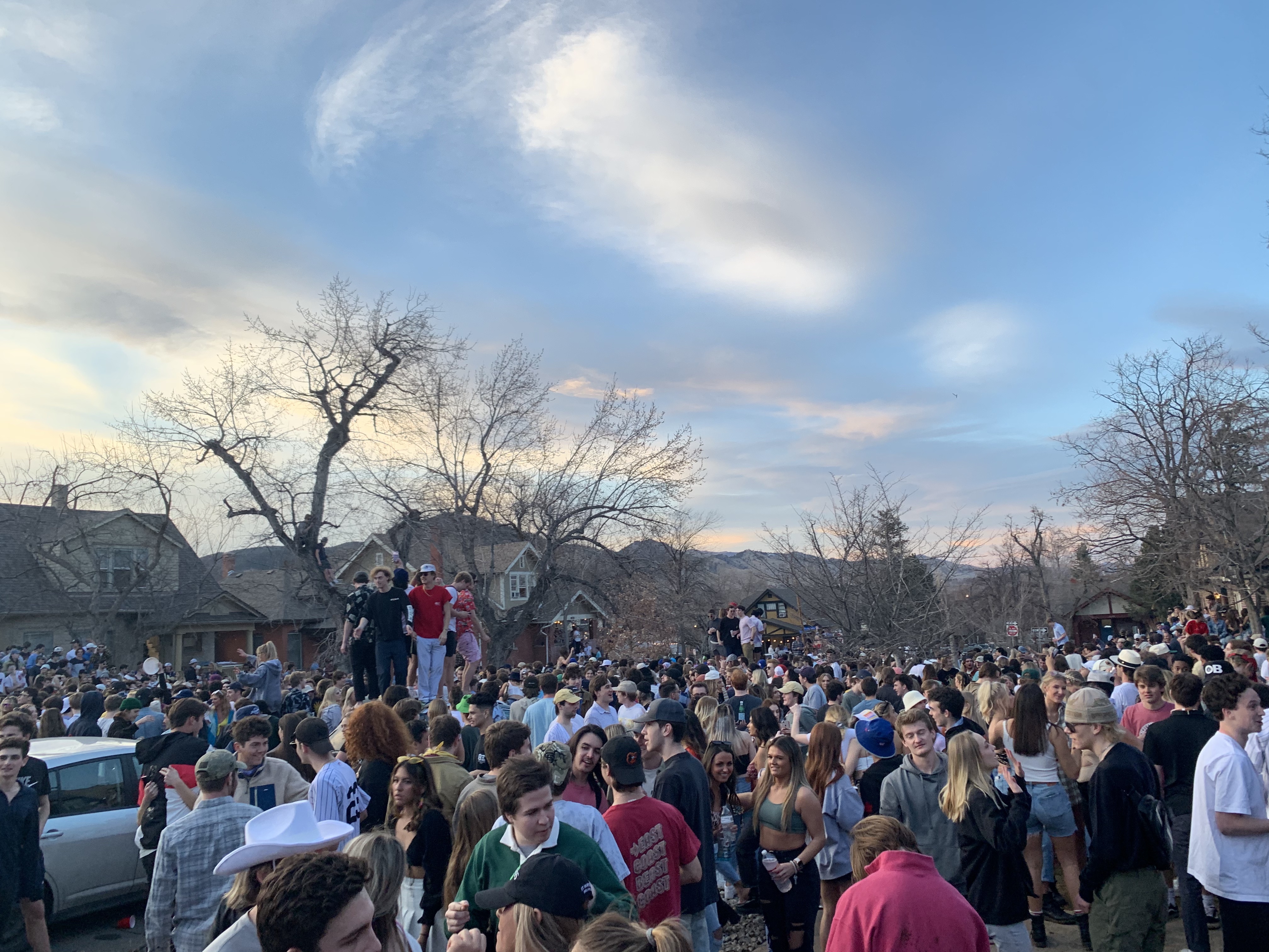A block party-turned-riot on March 6, 2021, on 10th Street in Boulder saw an estimated 800 people attend. In the mayhem, multiple cars were destroyed, including one being flipped over twice, and bottles were thrown at responding police officers which then led to tear gas being used to disperse the crowd. (Colin Bailey, CU NewsCorps)