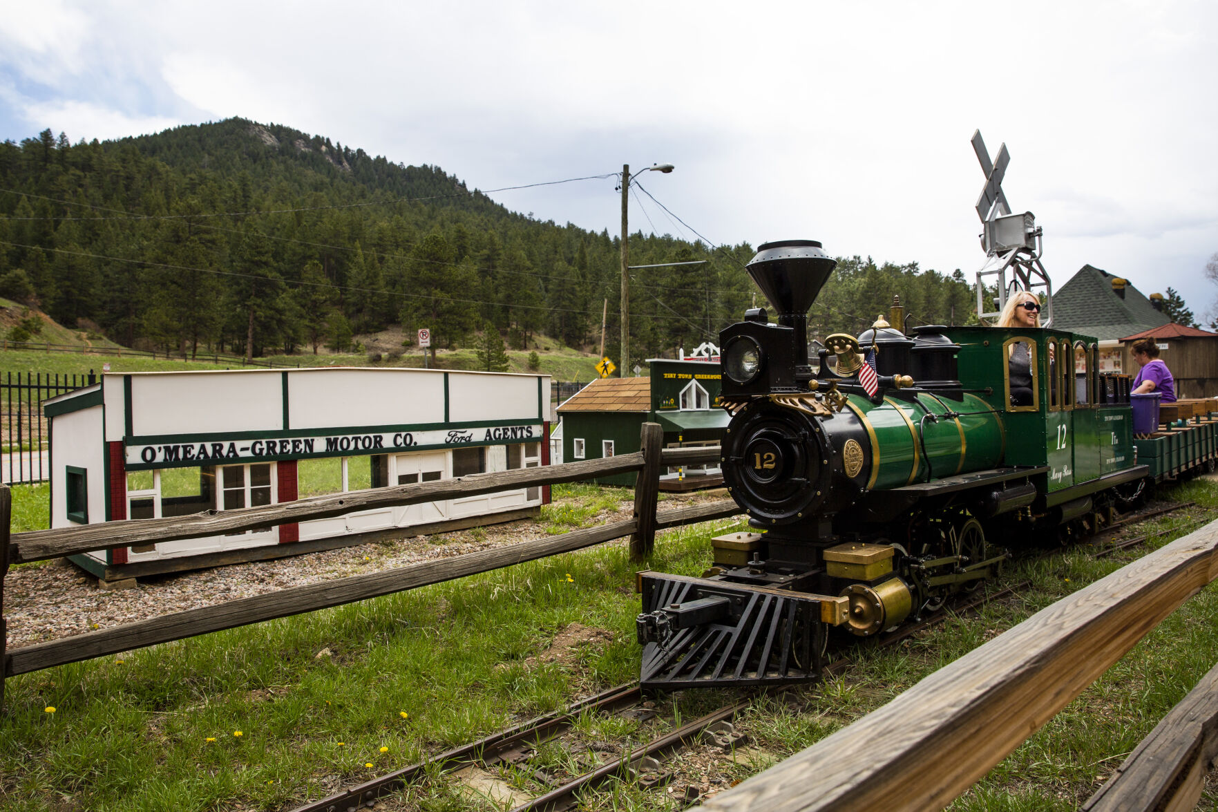Susie Couch rides the diesel train, named “Mary Ross,” through the miniature village at the Tiny Town and Railroad in Morrison. Tiny Town will be reopening on Saturday for the 2021 season. (KatieKlannkatie.klann@gazette.comhttps://secure.gravatar.com/avatar/15e8af752374ad1abb67090ceaed3ec3?d=mm&r=g)