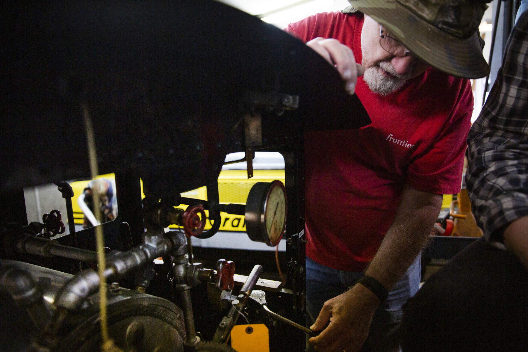 Engineer Dave Coplen explains the inner workings of a steam powered train on Friday, May 14, 2021 at the Tiny Town and Railroad in Morrison, Colo. Tiny Town will be re-opening on Saturday, May 29th for the 2021 season. (Katie Klann/The Gazette) (KatieKlannkatie.klann@gazette.comhttps://secure.gravatar.com/avatar/15e8af752374ad1abb67090ceaed3ec3?d=mm&r=g)