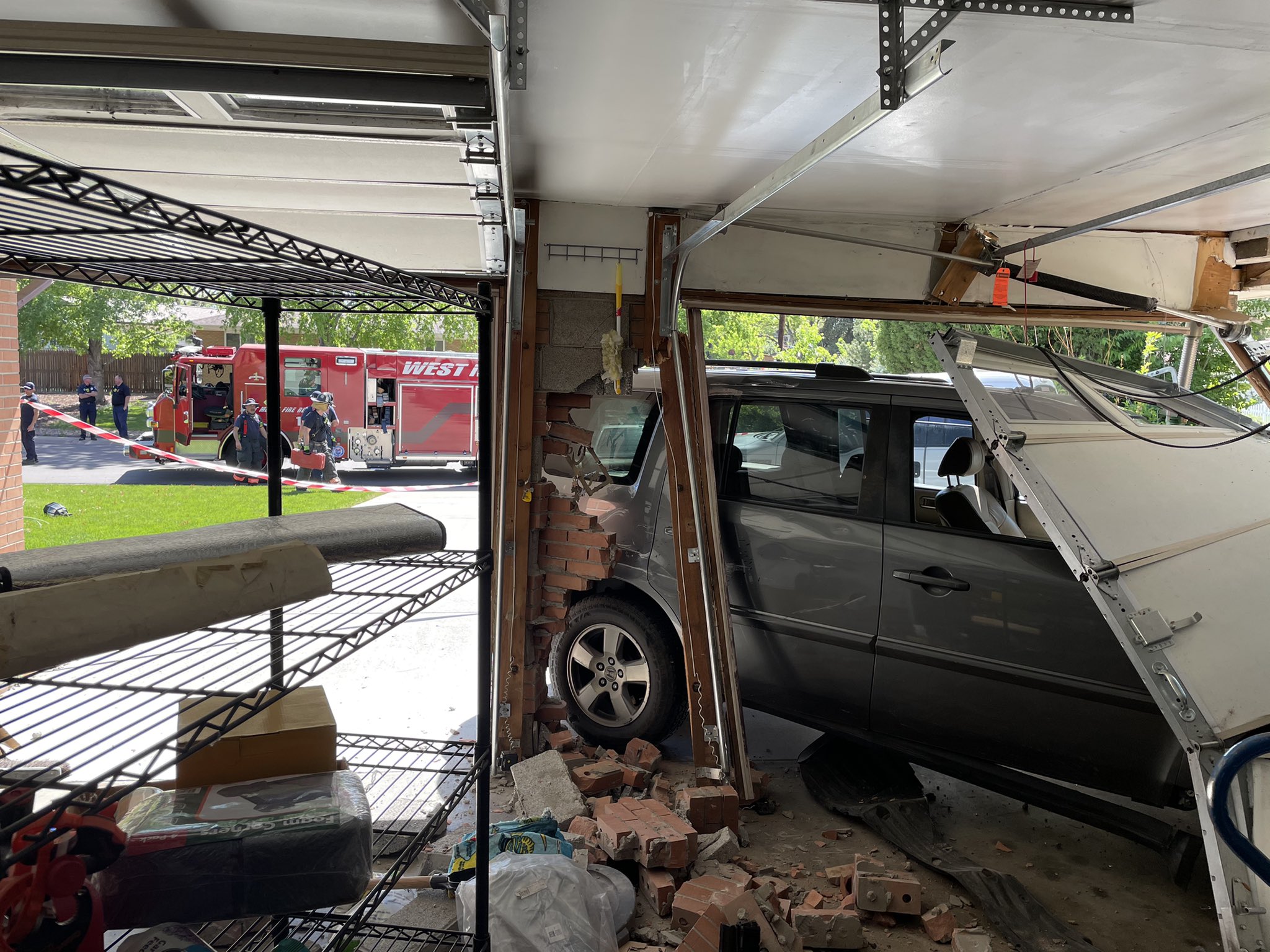 Car crashes into garage in Wheat Ridge; suspects at-large