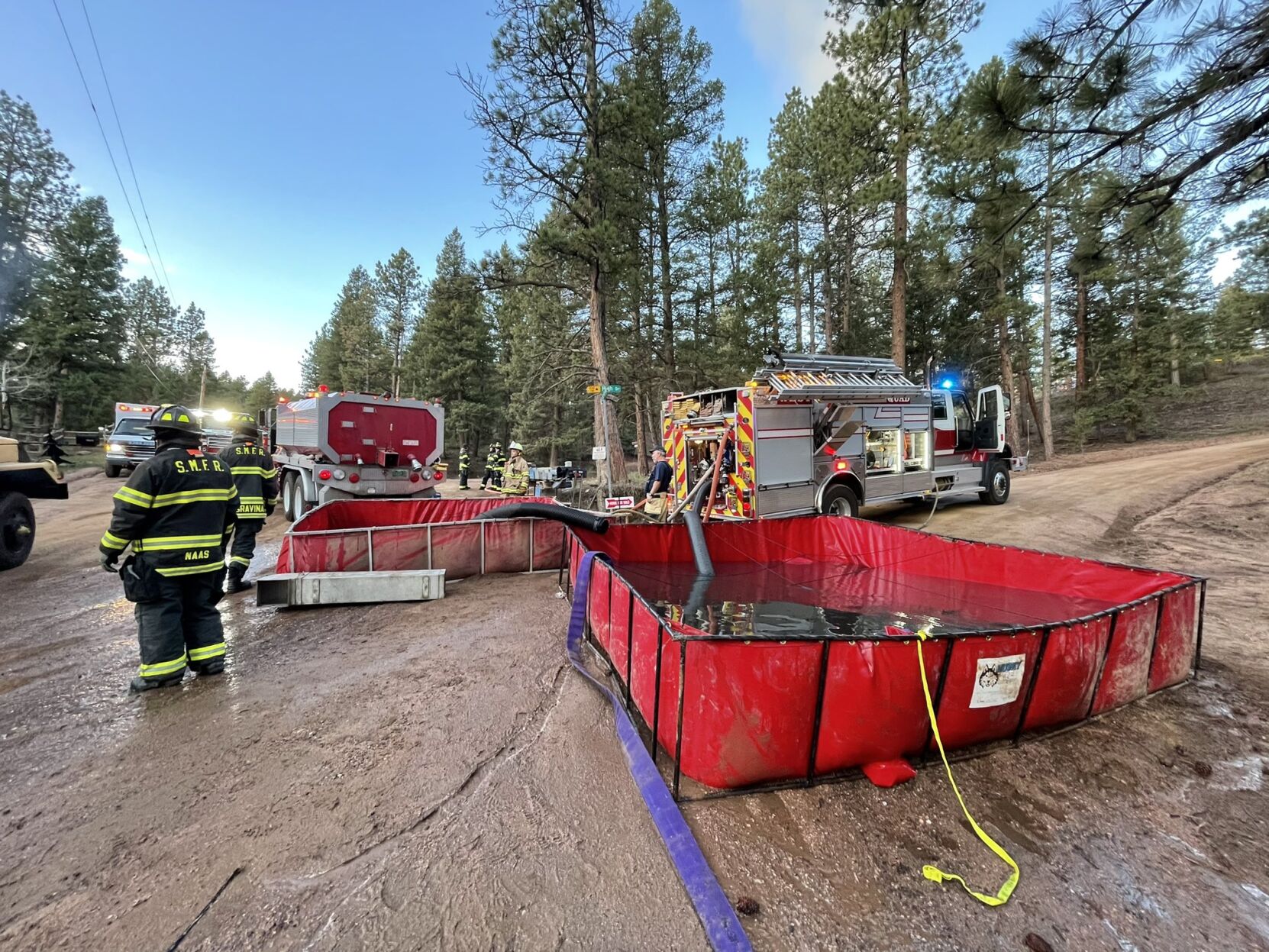 House fire in Douglas County stopped before reaching forest