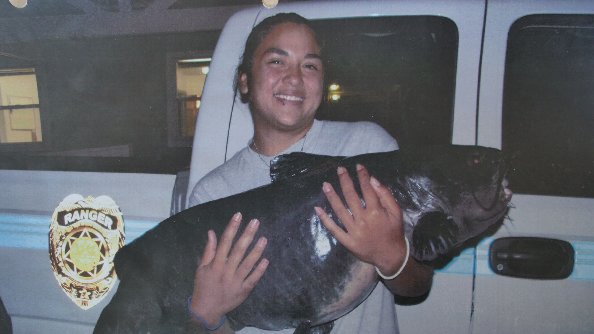 Jessica Walton with her Colorado record channel catfish weighing 43 pounds, pulled from Aurora Reservoir in 2010. Photo courtesy Colorado Parks and Wildlife