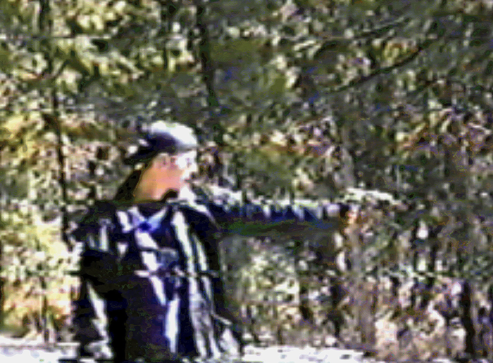Columbine gunman Eric Harris is shown firing a pistol in this frame grab of a video tape released by the Jefferson County Sheriff's Department on Wednesday, Oct. 22, 2003. (AP Photo/Jefferson County Sheriff's Department)