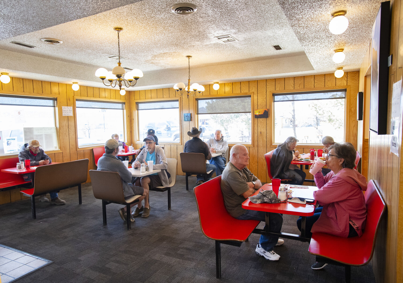 Customers sit last month for lunch in George’s Drive Inn in Walsenburg. (photos by Christian Murdock, The Gazette)