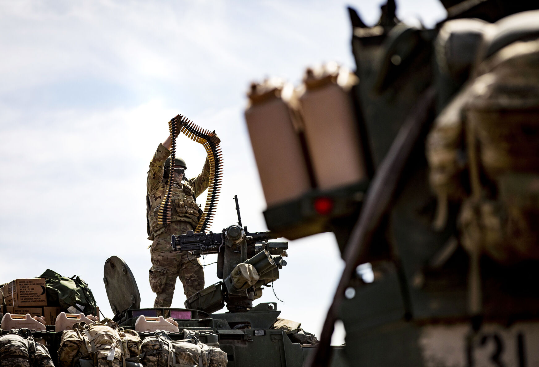 A 50-caliber machine gun is re-loaded on top of a Stryker by the 1st Brigade Combat Team, 4th Infantry Division, as the soldiers conduct a live-fire training downrange on Fort Carson military base on Wednesday, May 19, 2021. The required training started on May 5th, to prepare soldiers for potential missions they may be called on to support around the globe. The training has been extended to May 27th. (Chancey Bush/ The Gazette) (Chancey Bush/ The Gazette)