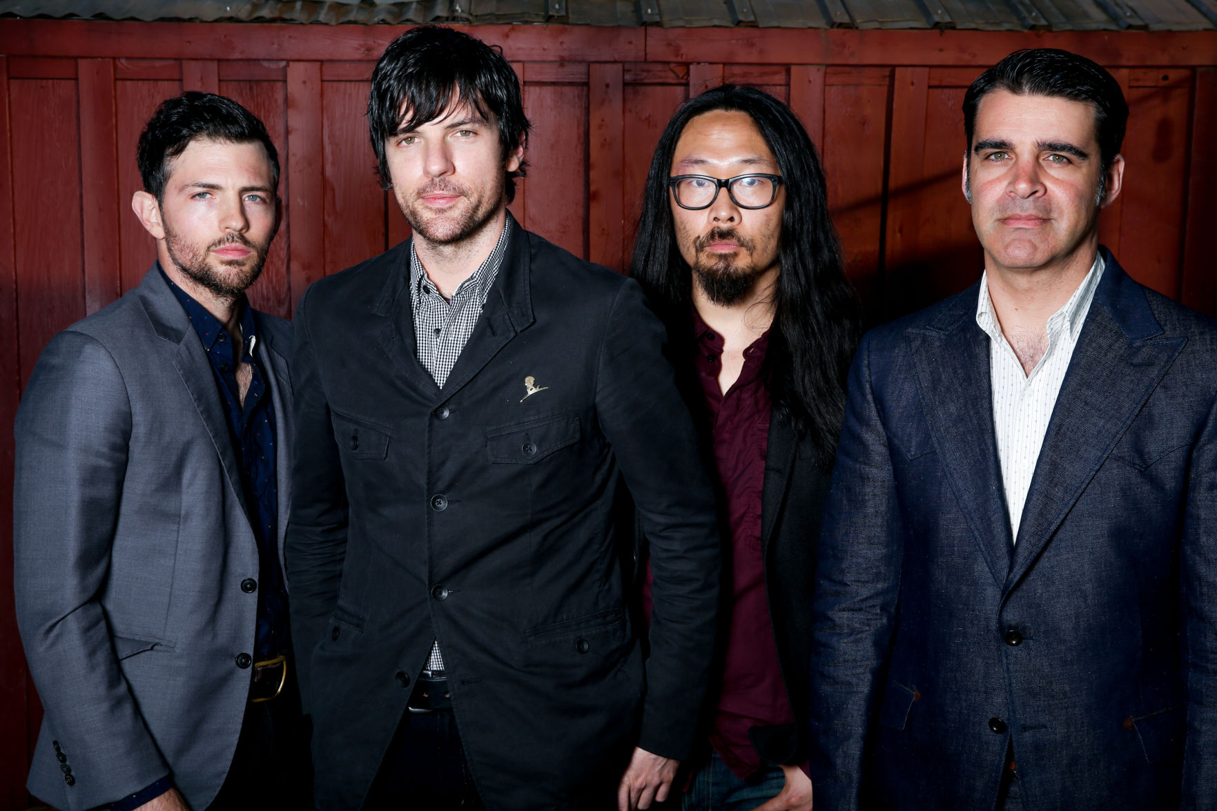 Scott Avett, from left, Seth Avett, Joe Kwon and Bob Crawford of The Avett Brothers pose for a portrait during South By Southwest on Thursday, March 17, 2016, in Austin, Texas. (Photo by Rich Fury/Invision/AP) (Rich Fury)