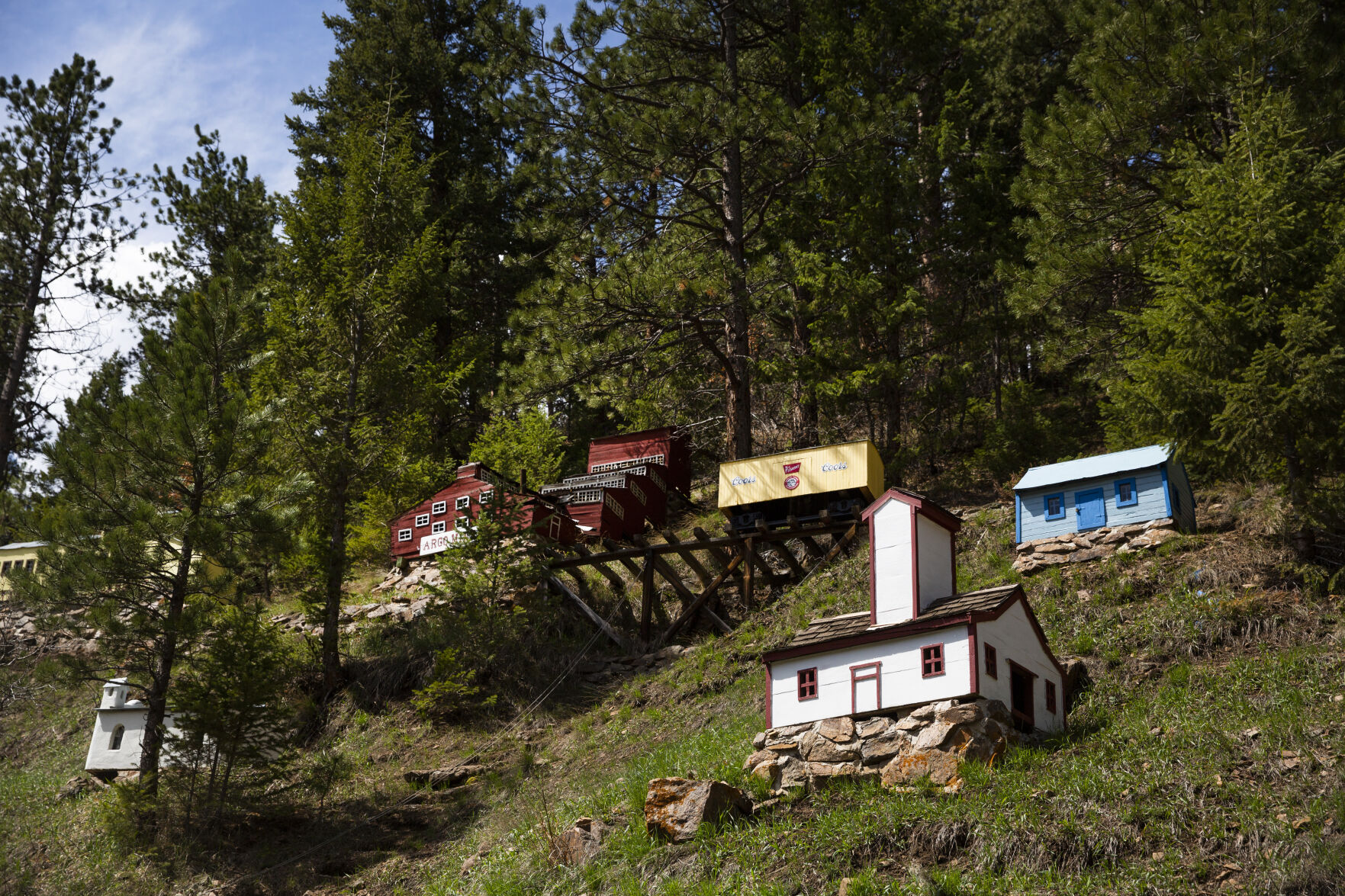 Miniature mining buildings sit on the hill at the Tiny Town and Railroad. (KatieKlannkatie.klann@gazette.comhttps://secure.gravatar.com/avatar/15e8af752374ad1abb67090ceaed3ec3?d=mm&r=g)