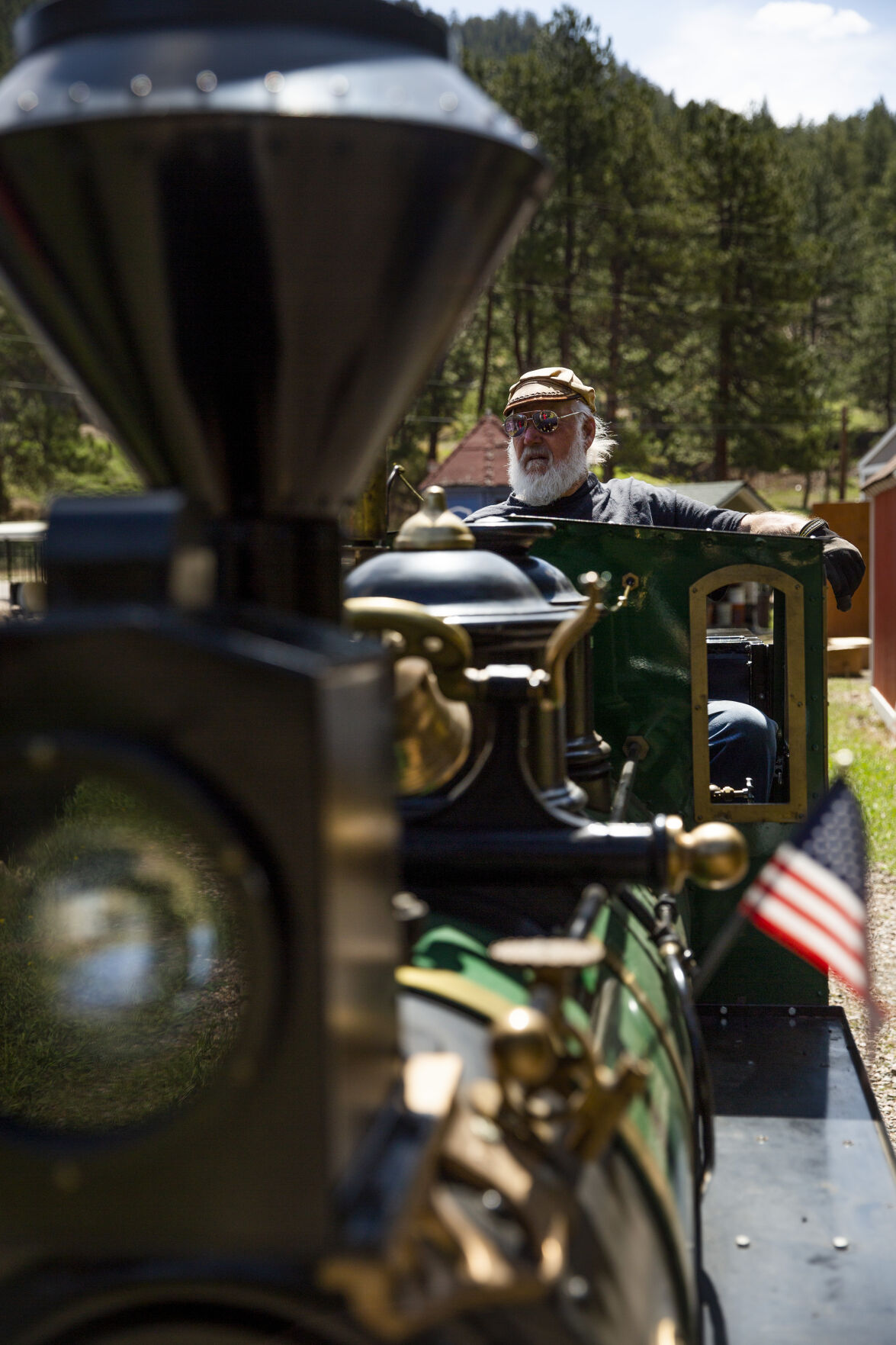 Engineer Dave Christopherson powers the diesel train ‘Mary Ross’ down on Friday, May 14, 2021 at the Tiny Town and Railroad in Morrison, Colo. Tiny Town will be re-opening on Saturday, May 29th for the 2021 season. (Katie Klann/The Gazette) (KatieKlannkatie.klann@gazette.comhttps://secure.gravatar.com/avatar/15e8af752374ad1abb67090ceaed3ec3?d=mm&r=g)