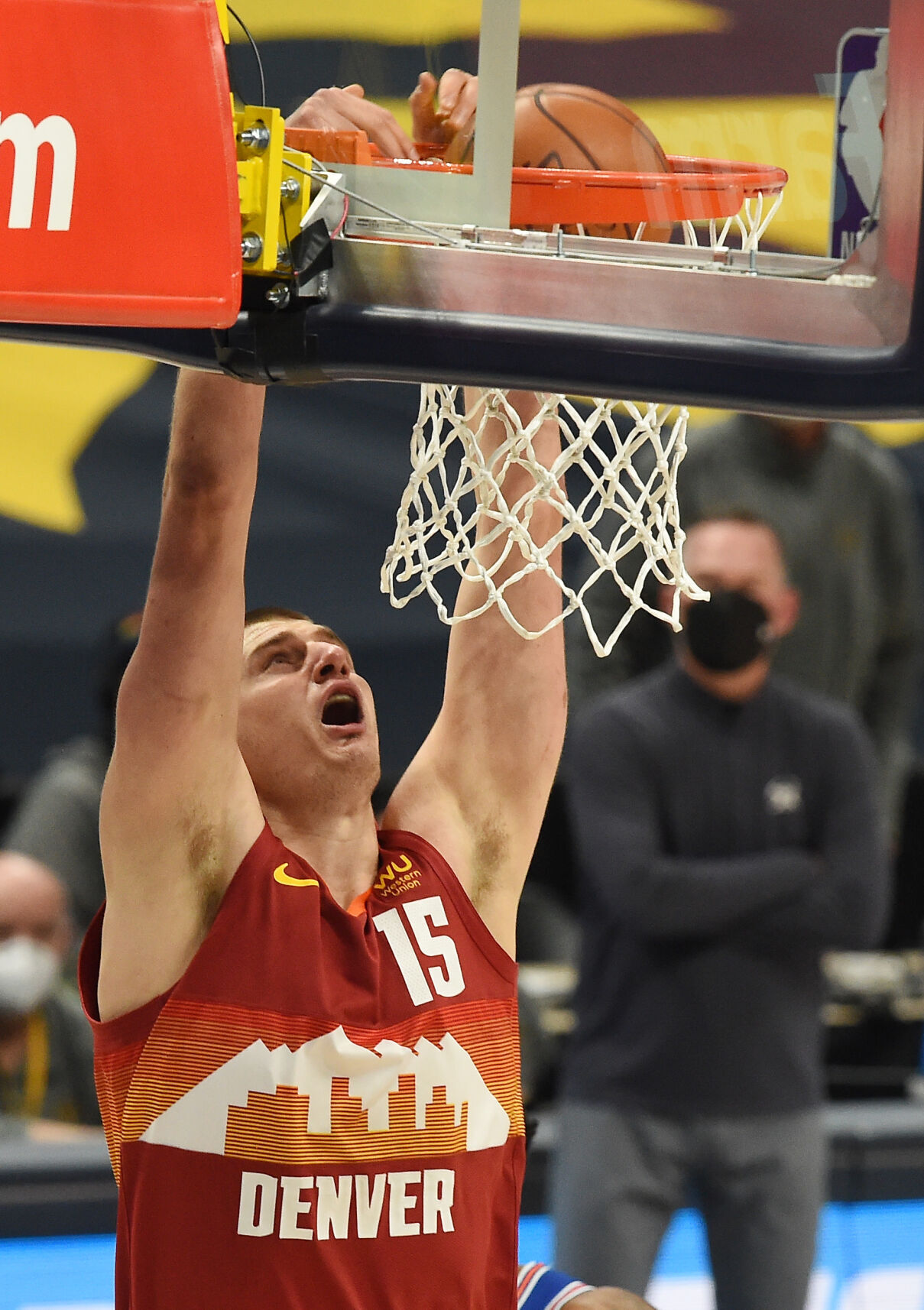 Nugget center Nikola Jokic gets the second of his four dunks in the first quarter of a game against the Knicks at Ball Arena on Wednesday, May 5, 2021. The Nuggets won the game 113-97.(The Gazette, Jerilee Bennett)