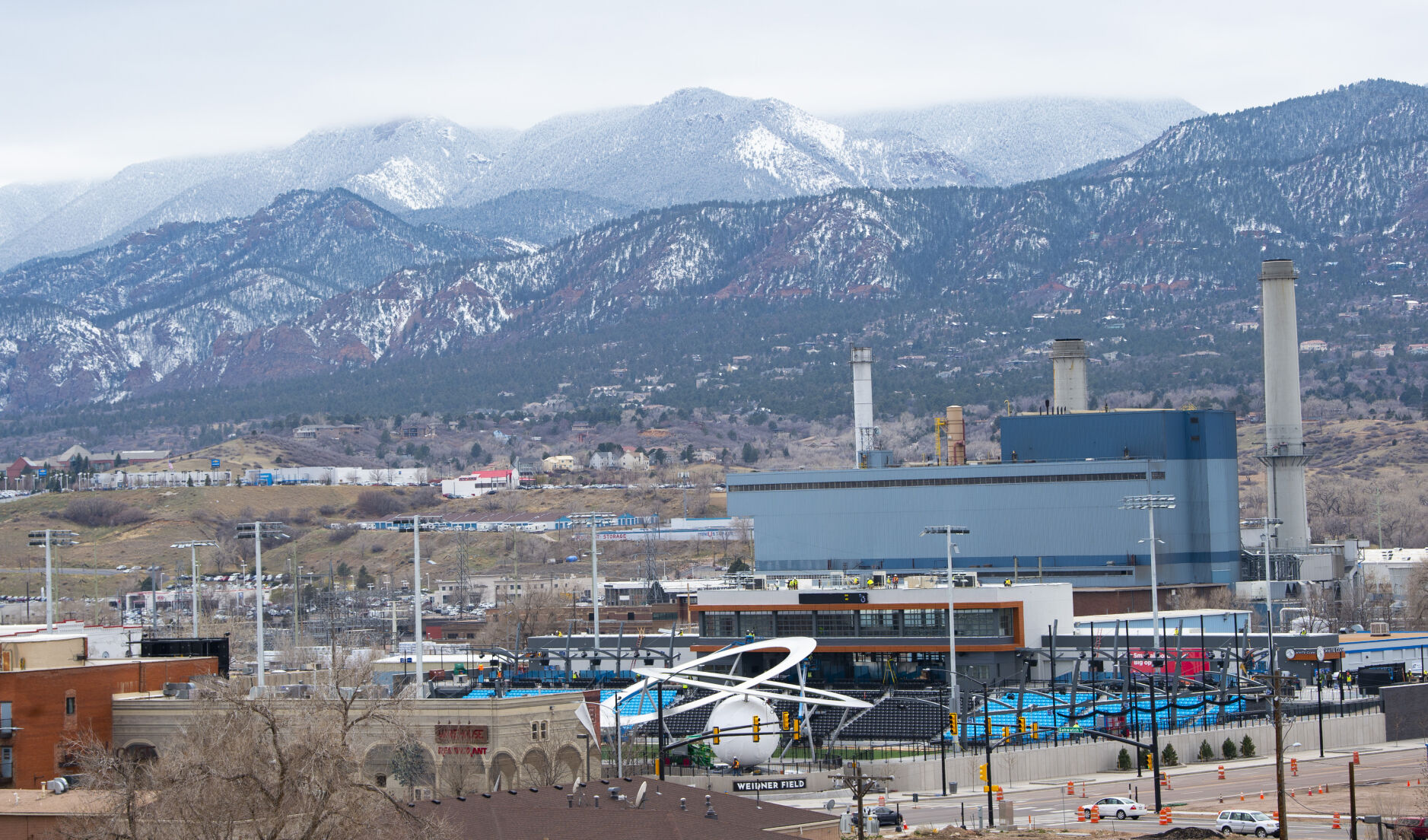 Crews work Wednesday, April 21, 2021, to finish the new home of the Switchbacks FC., Weidner Stadium, in downtown Colorado Springs for its opening this weekend. The sculpture at the stadium entrance will be revealed Friday night at 5 p.m. and the soccer team plays their first home preseason game 6 p.m. Saturday against Orange County SC. (The Gazette, Christian Murdock) (Christian Murdock/The Gazette)