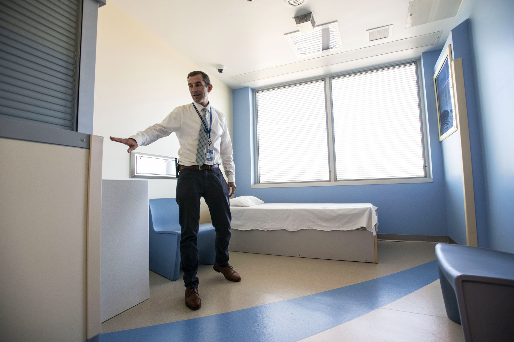 Dr. David Listman pointed out safety features in one of six exam rooms of the behavioral health unit during a tour of Children’s Hospital Colorado in Colorado Springs’ emergency department in 2019, when it first opened. ((Gazette file photo))