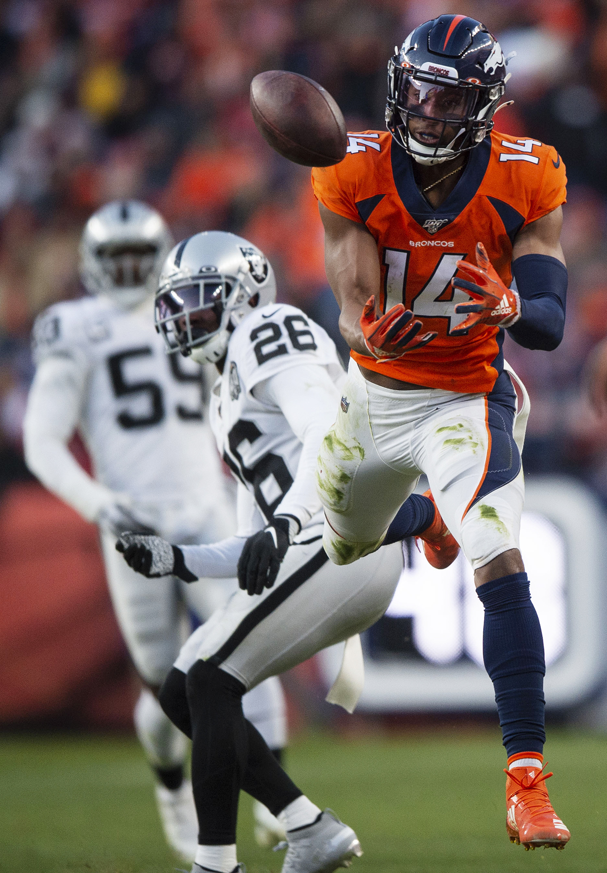 Denver Broncos wide receiver Courtland Sutton (14) attempts to catch a pass but it falls incomplete during the second half of the final game of the Denver Broncos season against the Oakland Raiders at Empower Field at Mile High in Denver on Dec. 29, 2019. The Broncos defeated the Raiders by a score of 16-15. (Chancey Bush/The Gazette)
