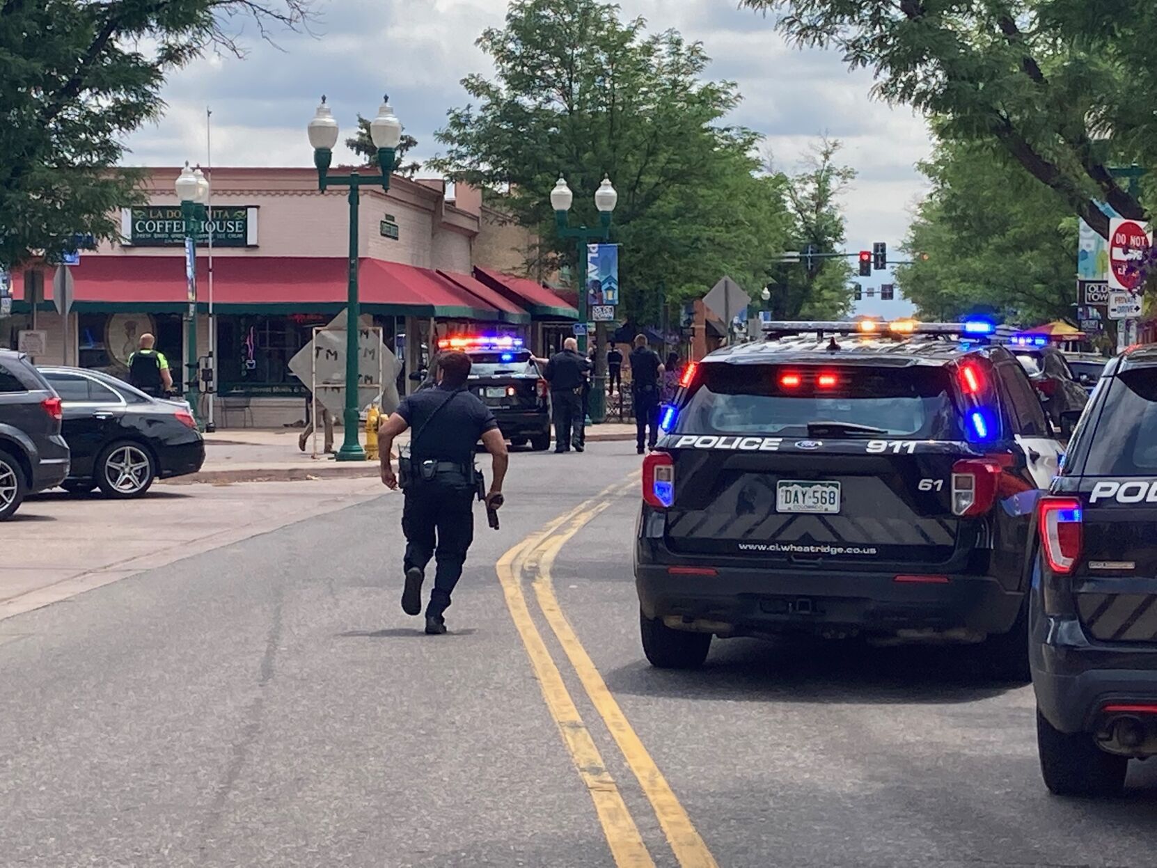 Police respond to Monday's shooting at Arvada's Olde Town Center. Three people, the alleged shooter, a police officer and a bystander were killed. (Courtesy Jeremy Wiest)