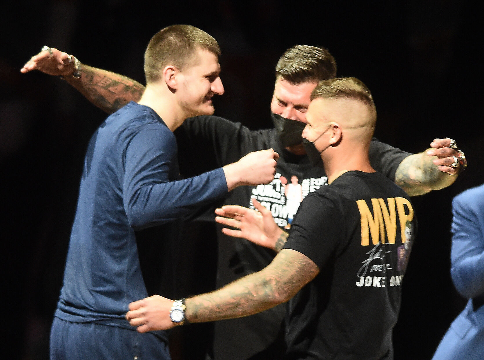 Denver’s Nikola Jokic is greeted by his brothers before being presented the NBA MVP trophy before game 3 of the conference semifinals at Ball Arena on Friday, June 11, 2021. Jokic is the first Denver Nugget to get an MVP award and the first second round draft pick to get the award. (Photo by Jerilee Bennett, The Gazette) (JERILEE BENNETT)