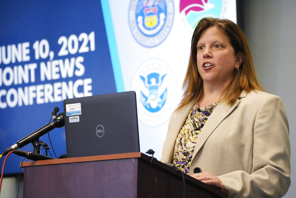 Deanne Reuter, special agent in charge of the Drug Enforcement Administration, makes a point during a news conference Thursday, June 10, 2021,in Centennial, Colo. Three agencies—the Drug Enforcement Administration, Homeland Security Investigations and the office of the district attorney in Colorado’s 18th Judicial District—held the news conference to explain the major grand jury indictments issued in a money-laundering scheme involving the distribution of drugs by major cartels and how the money earned was then laundered through contacts in China. ((AP Photo/David Zalubowski))