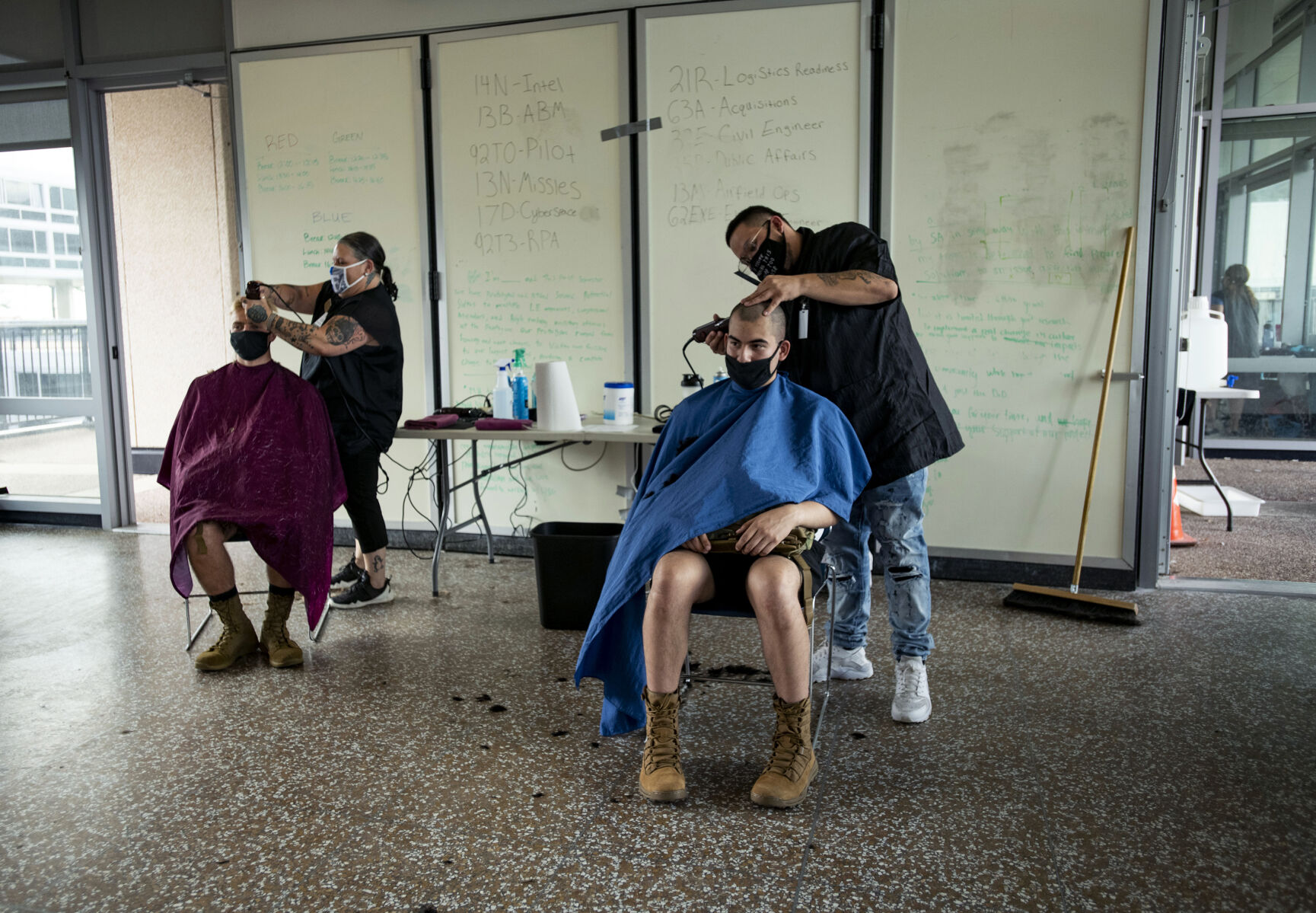 Basic cadets get their heads shaved during In-Processing Day at the United States Air Force Academy in Colorado Springs, Colo., on Thursday, June 24, 2021. Over 1,100 incoming freshman will endure six weeks of basic training before officially becoming cadets.(Chancey Bush/ The Gazette) (Chancey Bush/ The Gazette)