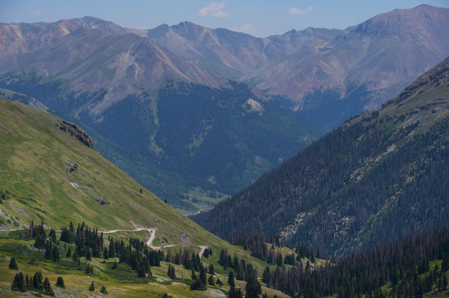 A four-wheel drive vehicle descends 12,620-foot Cinnamon Pass toward American Basin and Lake City. (Christian Murdock, The Gazette file)