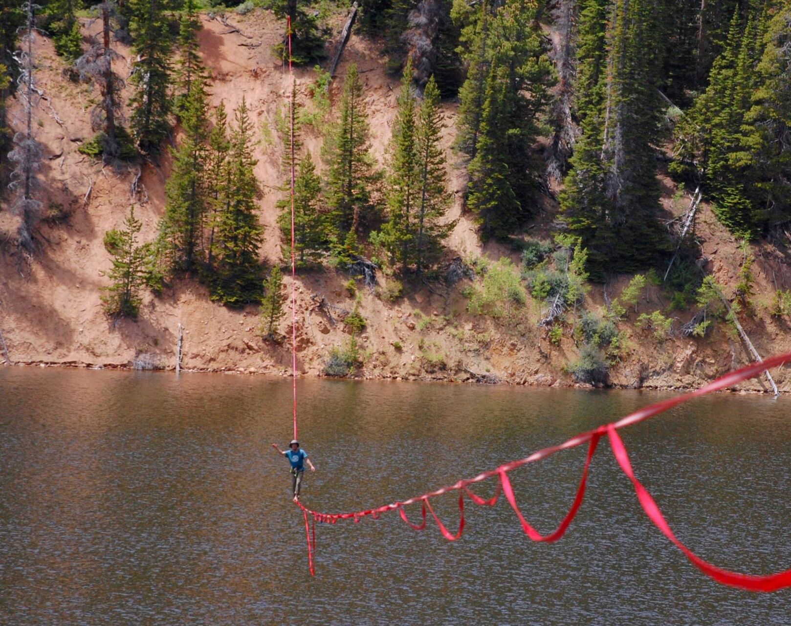 Dakota Collins of Fort Collins highlines over an alpine lake in northwest Colorado. Photo courtesy Dakota Collins