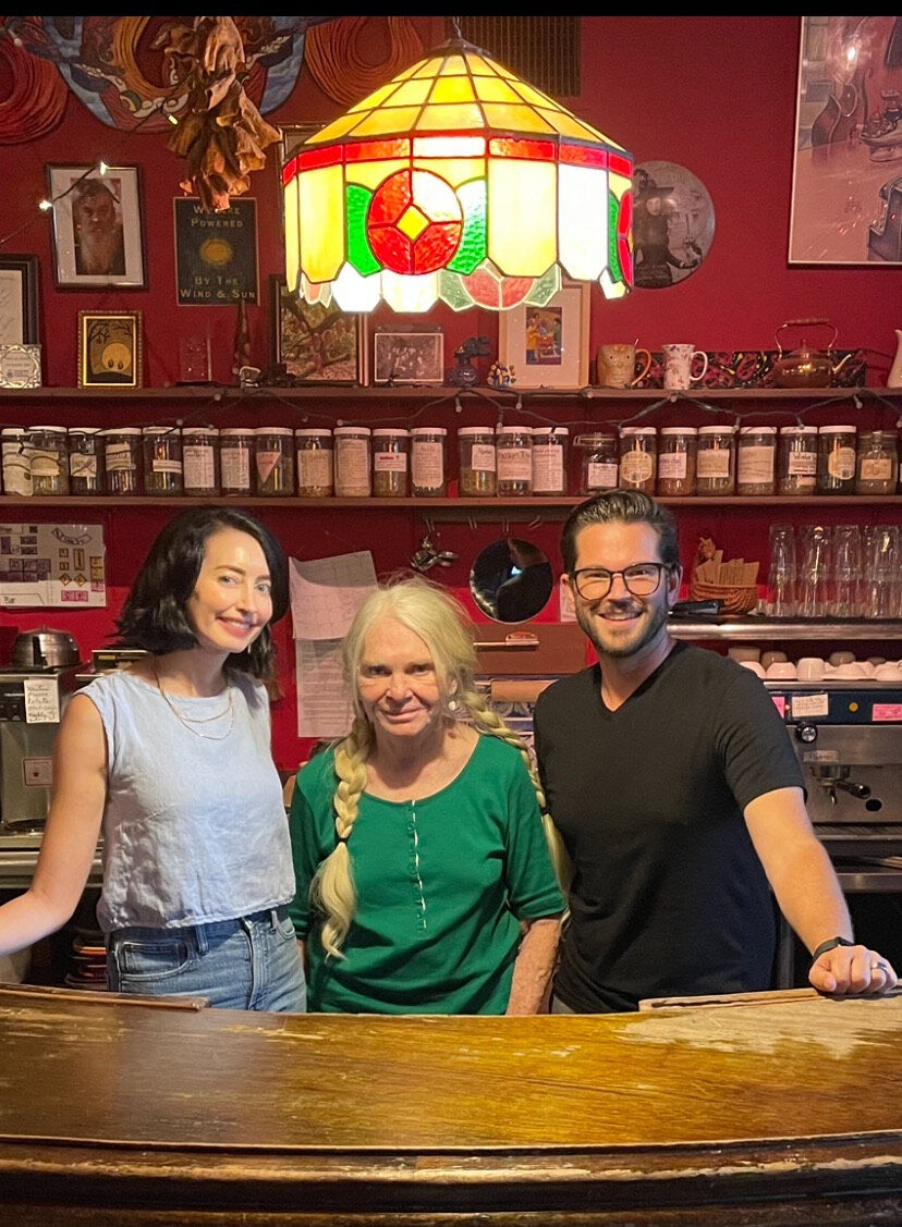 New Mercury Cafe owners Christy Kruzick and Danny Newman with seller Marilyn Megenity.