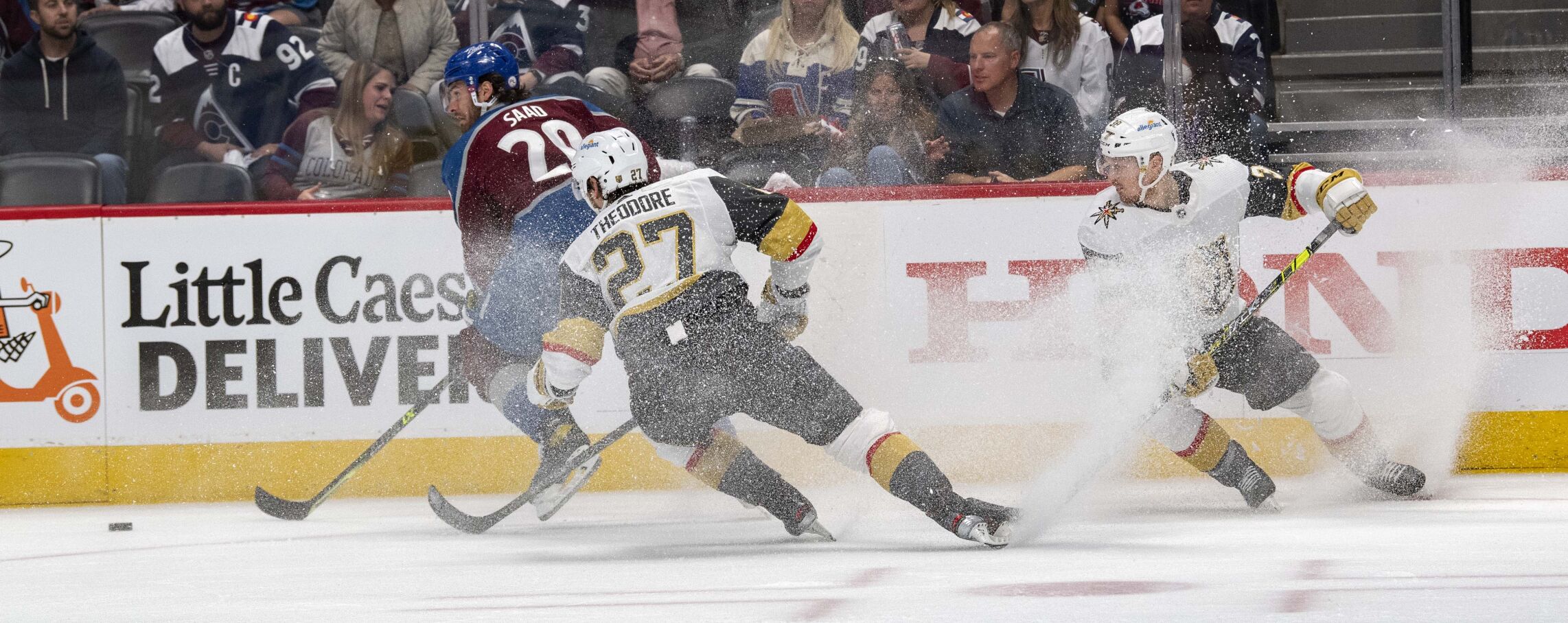 Colorado Avalanche left wing Brandon Saad (20) moves the puck against Vegas Golden Knights defenseman Shea Theodore (27) and Vegas Golden Knights center Patrick Brown (38) during the second period of game two in the second round of the Stanley Cup Playoffs Wednesday, June 2, 2021, at Ball Arena in Denver. (The Gazette, Christian Murdock) (Christian Murdock/The Gazette)