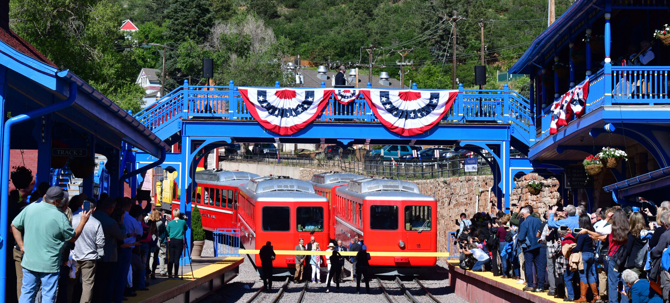 Hundreds gather for the ribbon cutting Wednesday, June 30, 2021, to celebrate the reopening of the Broadmoor Manitou & Pikes Peak Cog Railway.