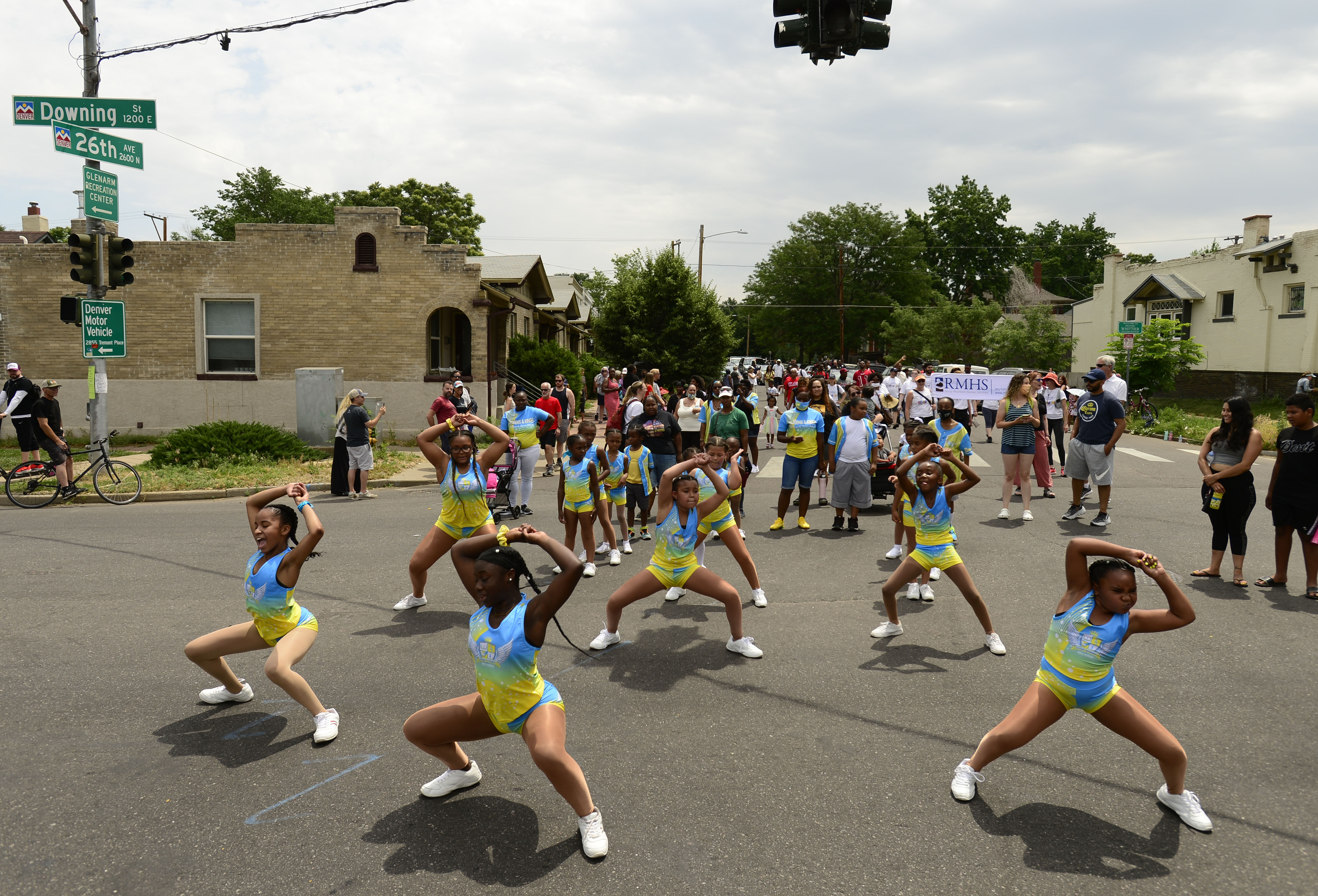 JUNE 19, 2021 - Performers danced in the street at 26th Ave and Downing as Denver kicked off Juneteenth with the annual parade march from Manual High School to Five Points where there were well over 200 booths lining Welton Street. The Street Festival is open 2-8 p.m over the weekend with food, music and live entertainment. Juneteenth is celebrated each year on June 19 and commemorates the end of chattel slavery in the U.S., and now Congress has voted to mark the date as a federal holiday. (Photo by John Leyba) (John Leyba)