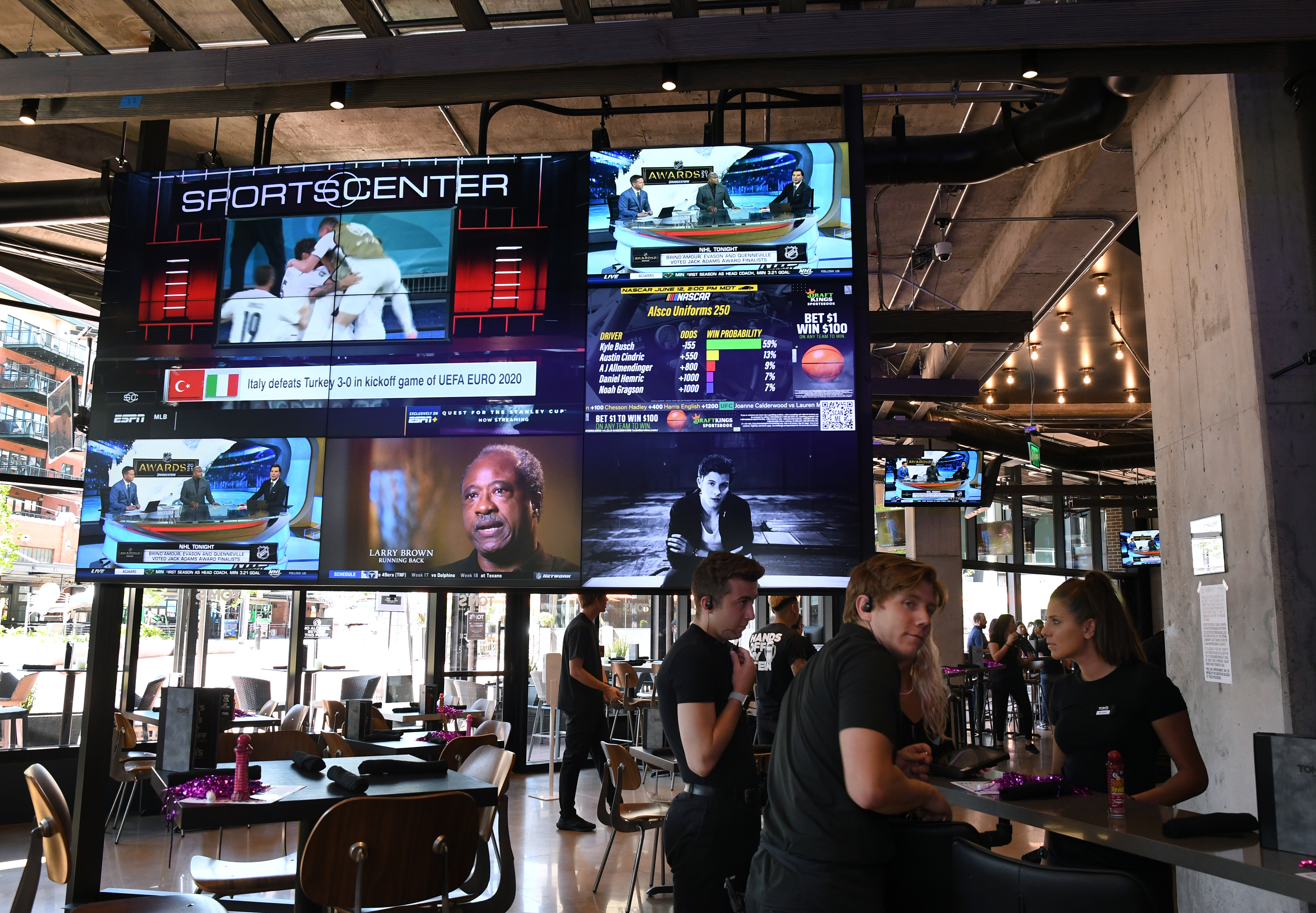 DENVER, CO - JUNE 11: The bartenders and wait staff at Tom’s Watch Bar prepare for a soft-opening of the restaurant in McGregor Square. McGregor Square hosts its grand opening celebration on June 11, 2021 in Denver, Colorado. The new complex, located across the street from Coors Field ballpark, includes a new hotel, luxury condos, office space, a Tattered Cover bookstore, and bars and restaurants. (Kathryn Scott, Denver Gazette)