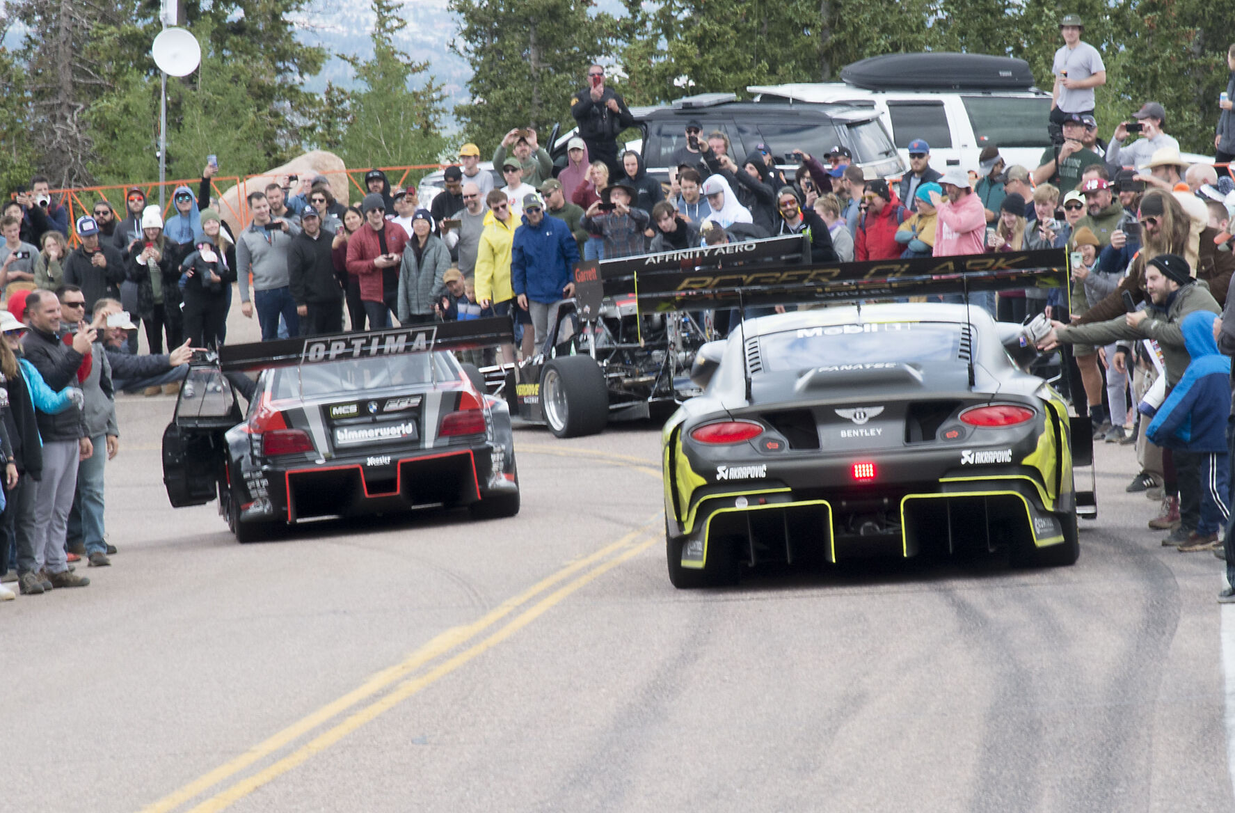 Members of the Parade of Champions greet spectators at the end of Sunday’s 99th running of the Race to the Clouds. (Courtesy of Robert Kelley)