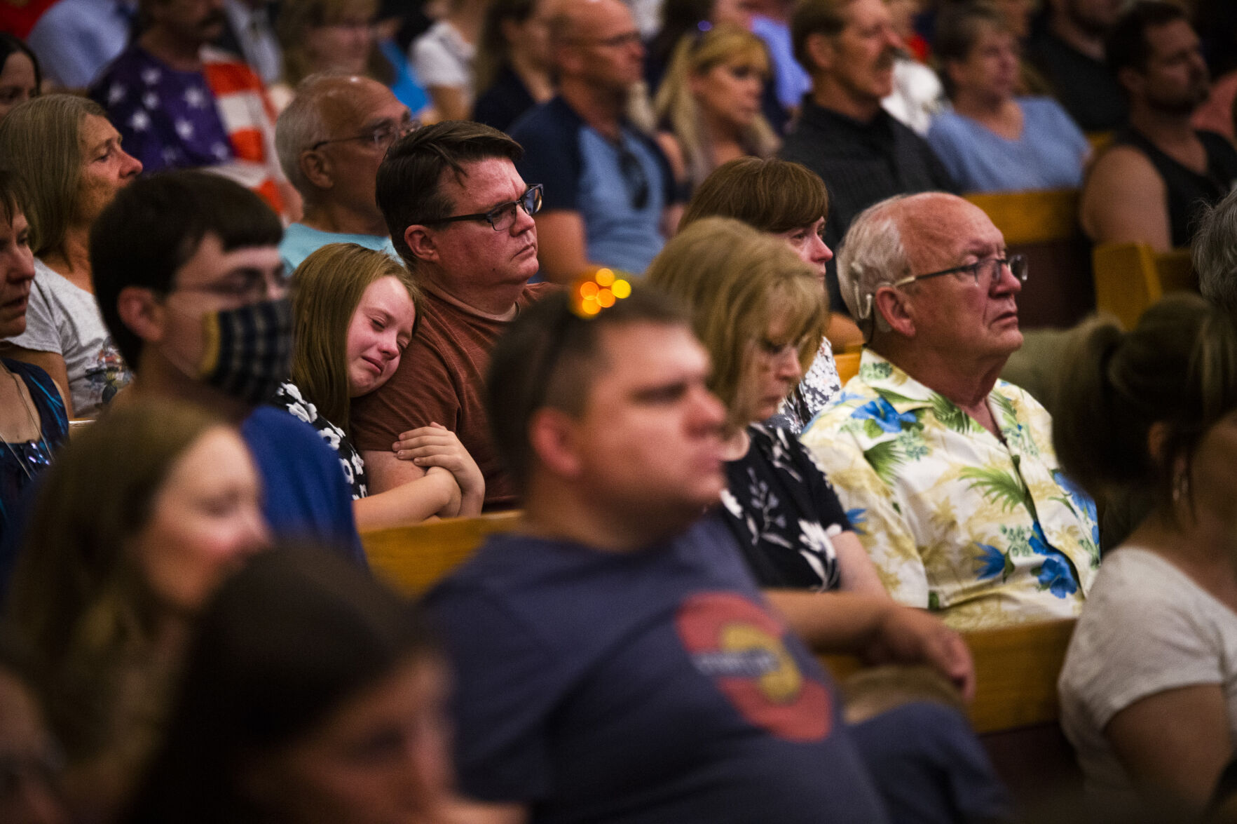 A young girl cries during a community vigil for fallen Officer Gordon Beesley on Tuesday, June 22, 2021 at Peace Lutheran Church in Arvada, Colo. (Katie Klann/The Denver Gazette) (Katie Klann The Gazette)