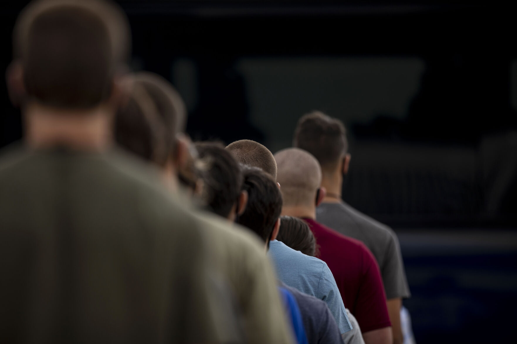 Basic cadets load onto a bus during In-Processing Day at the United States Air Force Academy in Colorado Springs, Colo., on Thursday, June 24, 2021. Over 1,100 incoming freshman will endure six weeks of basic training before officially becoming cadets.(Chancey Bush/ The Gazette) (Chancey Bush/ The Gazette)
